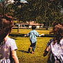 child, children, outdoor, grass, running, tree, dress, plaid_shirt, playing, sunny, daytime, field, back_view, boy, girl, nature, house, fence, casual_clothing, summer