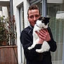 Pixel a rejoint le concours — aidez-le/la à gagner de superbes lots ! adult, animal, cat, clothing, door, face, formalwear, head, jar, male, man, person, photography, plant, planter, portrait, pottedplant, pottery, suit, vase