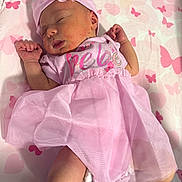 Aviya joined the competition — help win amazing prizes! adorable, baby, blanket, butterfly_pattern, child, closeup, cute, headband, indoors, infant, lying_down, newborn, peaceful, pink_dress, portrait, sleep, sleeping, small_hands, soft_fabric, toddler
