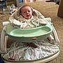 baby, infant, baby_seat, fisher_price, carpet, indoor, person, feet, toy, household, floor, door, walking, plastic_container, plate, food, slippers, clothing, face, expression