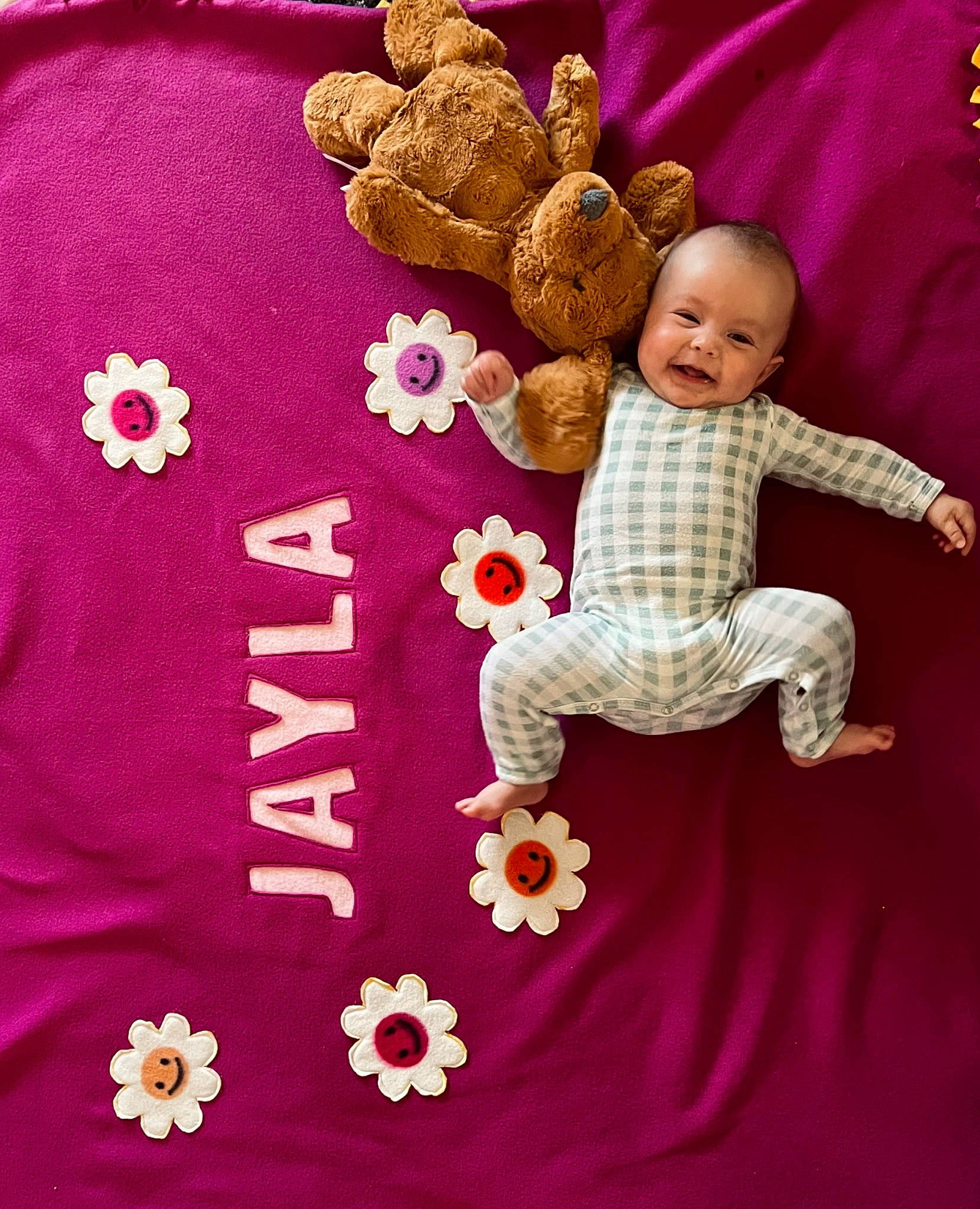 Jayla is registered to the contest to win money with this photo: baby, baby_products, baby_sleeping, baby_toddler_clothing, child, comfort, font, happy, joy, linens, magenta, outerwear, pattern, person, pink, product, sleeve, stuffed_toy, t_shirt, textile