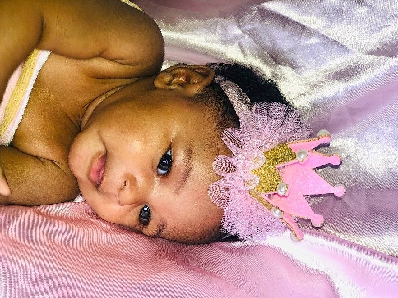 Ashanti is registered to the contest to win money with this photo: baby, beauty, cheek, child, close_up, eye, eyebrow, face, hand, head, headwear, human, iris, lip, mouth, muscle, nose, person, photography, pink