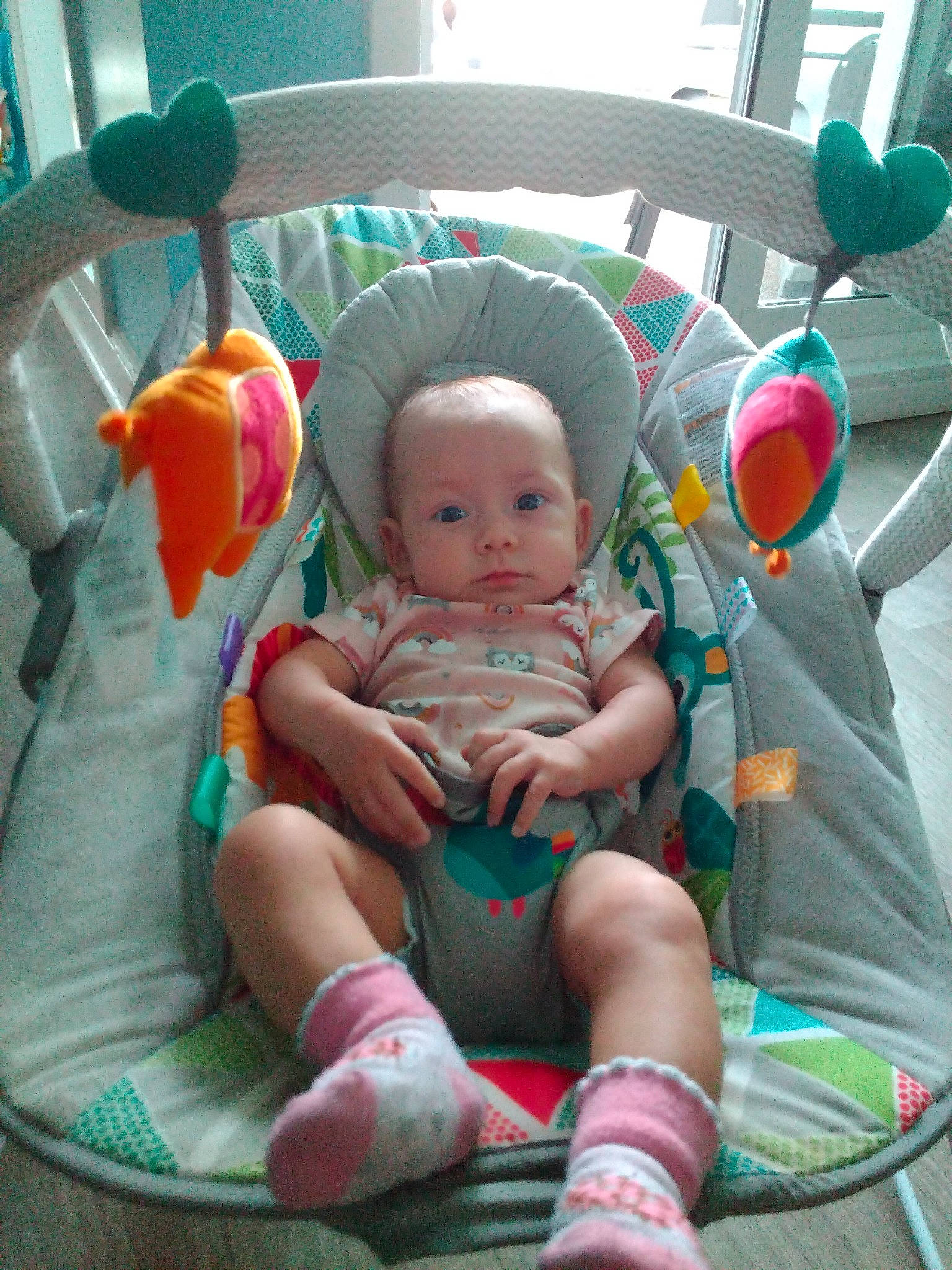 Luna joined the competition — help win amazing prizes! baby, baby_carriage, baby_products, baby_toddler_clothing, child, comfort, foot, fun, human_leg, lap, leisure, microphone, person, pink, product, sitting, stuffed_toy, textile, thigh, toddler