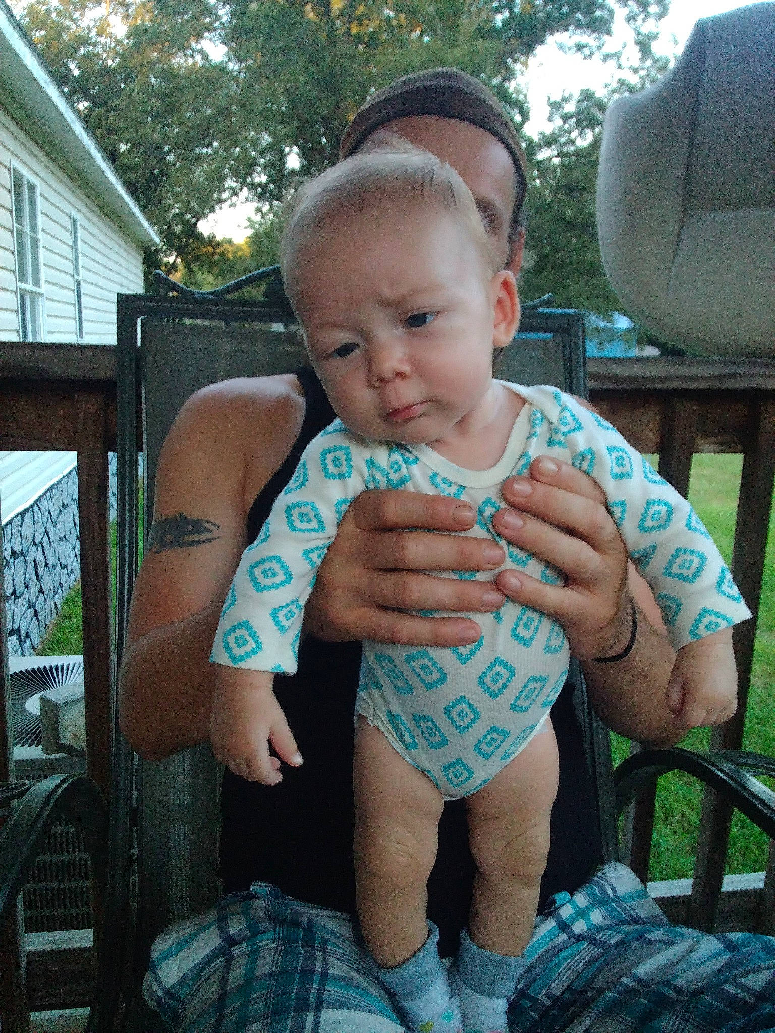 Luna is registered to the contest to win money with this photo: baby, baby_toddler_clothing, chest, child, cool, finger, fun, grass, leisure, muscle, nail, person, plaid, sitting, skin, tartan, thigh, thumb, toddler, tree