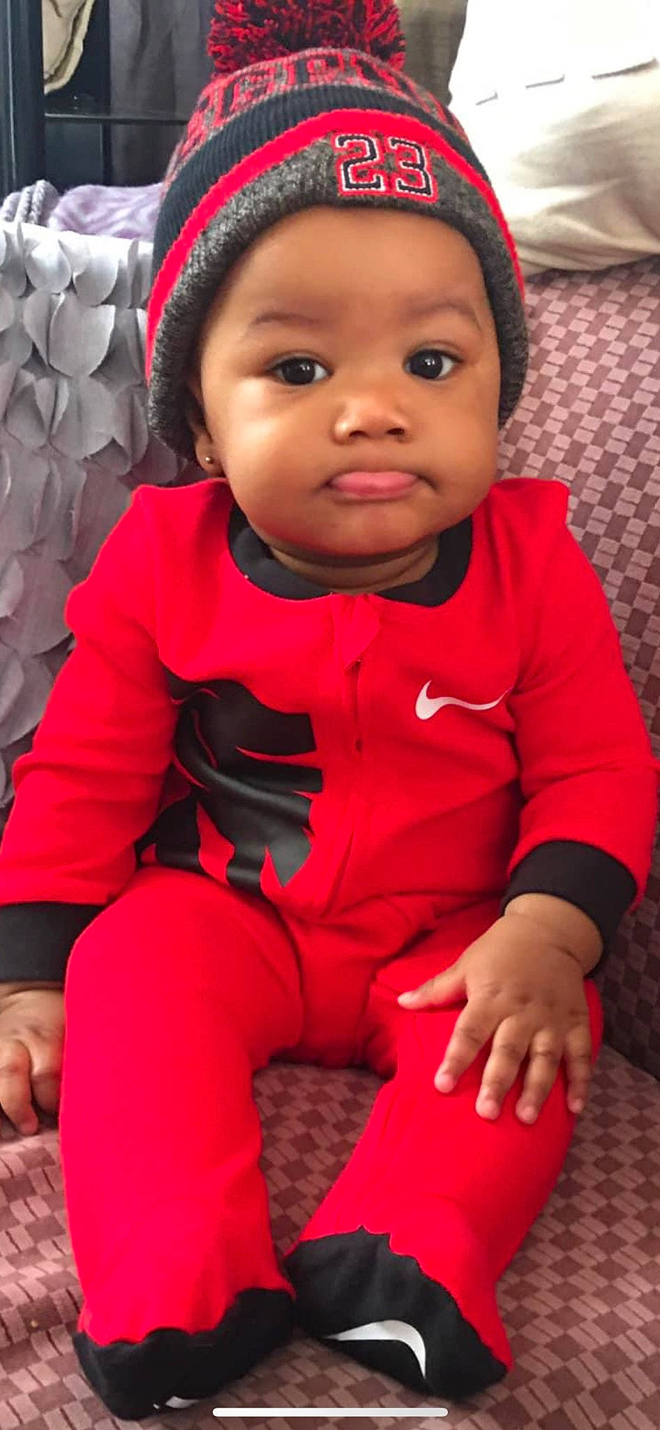 Aulonte is registered to the contest to win money with this photo: baby, baby_toddler_clothing, beauty, black, cap, cheek, child, comfort, cool, face, finger, happy, headwear, lip, nose, outerwear, person, pink, red, skin