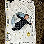 Coltyn joined the competition — help win amazing prizes! baby, infant, milestone_blanket, smiley_face_onesie, stars, moon, carpet, baby_toy, lying_down, age_marker, cute, child, indoors, floor, blanket, patterned, cozy, portrait, young_child, playtime
