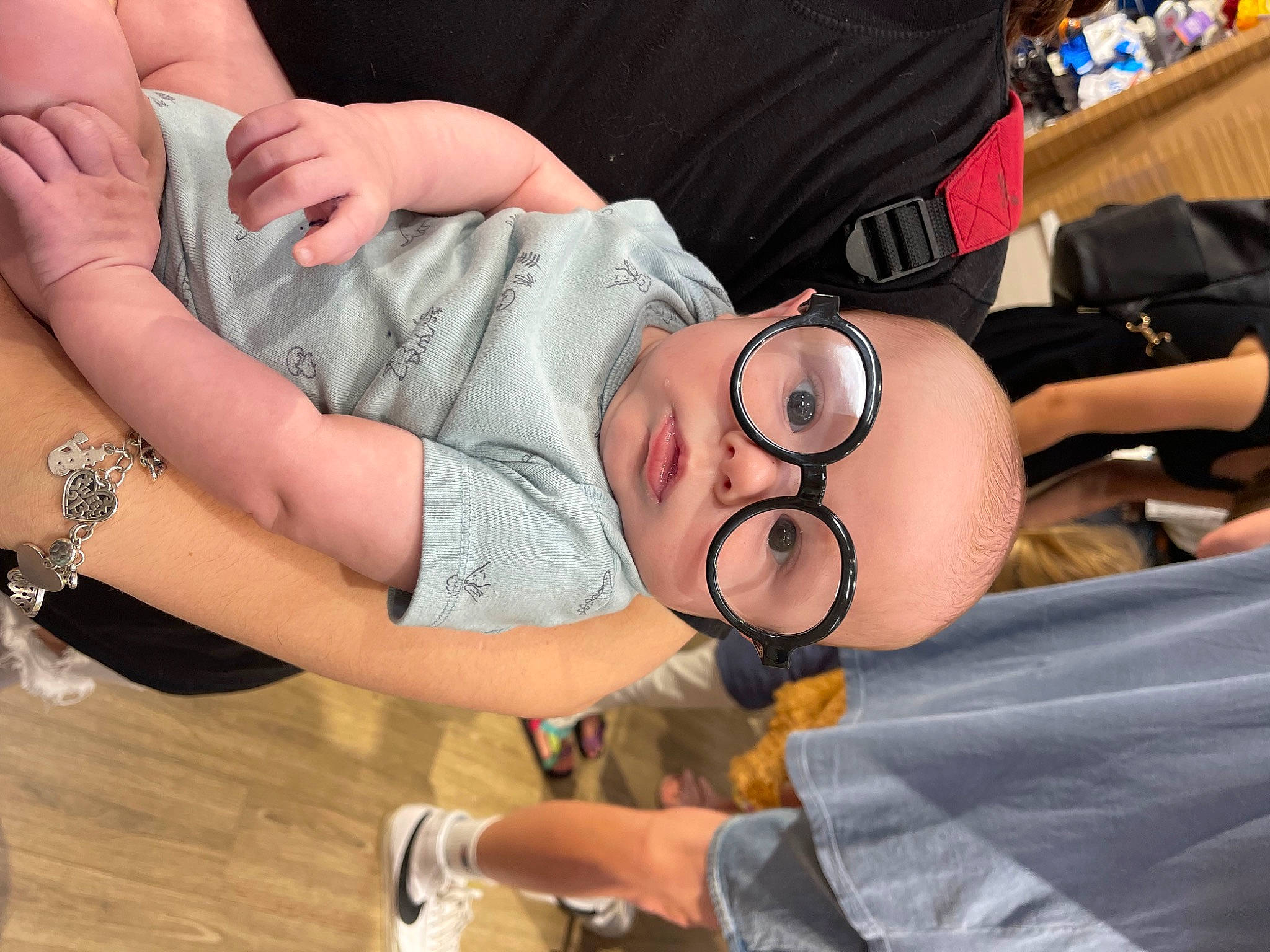 Sasha is registered to the contest to win money with this photo: abdomen, black_hair, elbow, eyewear, finger, gesture, glasses, hand, hat, joint, knee, muscle, nail, person, shoulder, sunglasses, thigh, thumb, trunk, vision_care