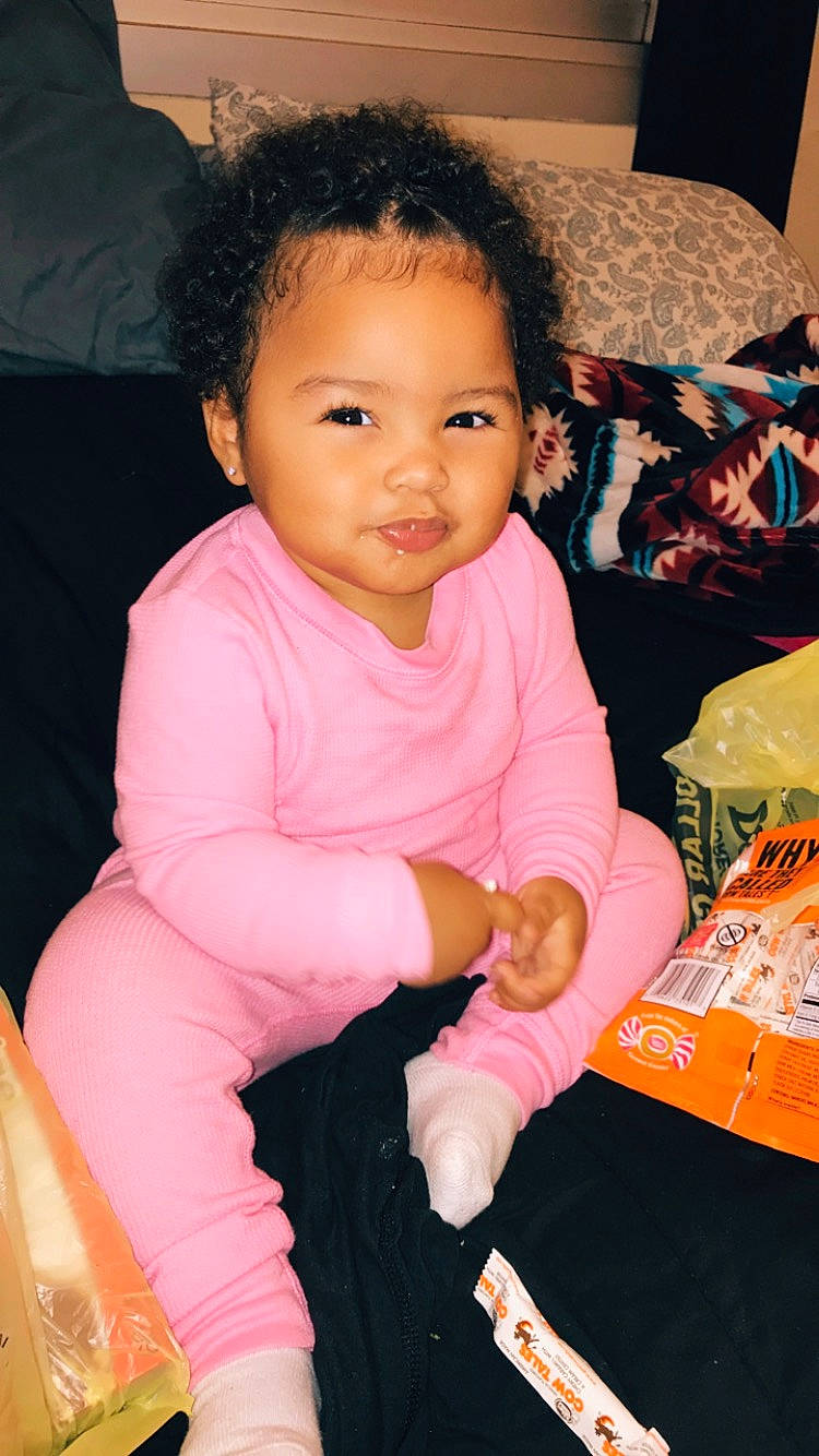 Jaida is registered to the contest to win money with this photo: baby, cheek, child, person, pink, sitting, skin, toddler