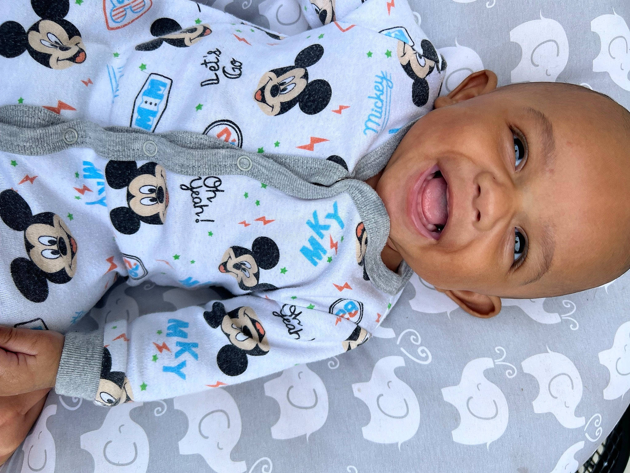 Carter is registered to the contest to win money with this photo: baby, baby_laughing, baby_products, baby_toddler_clothing, carmine, cheek, child, comfort, facial_expression, happy, laugh, linens, pattern, person, product, room, sleeve, smile, t_shirt, toddler