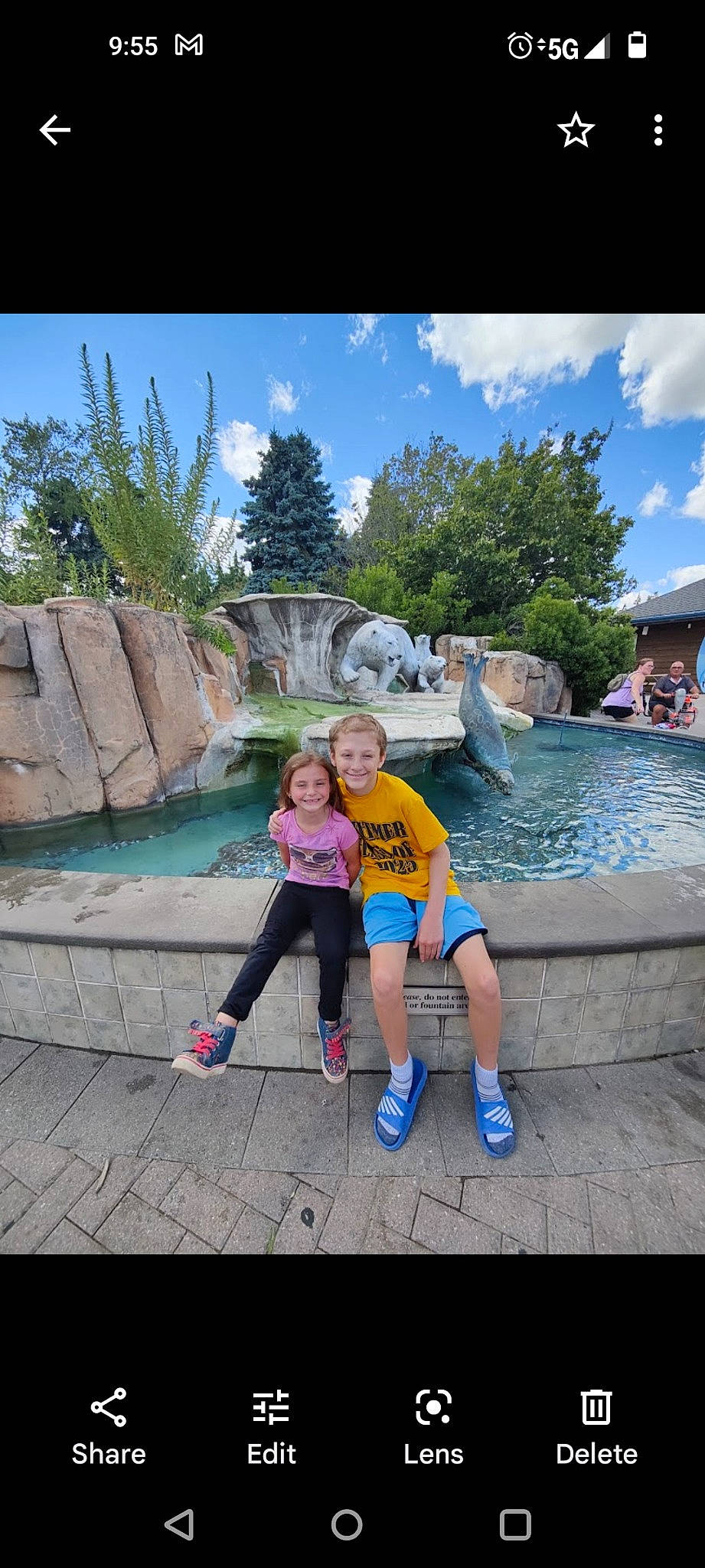 Tina joined the competition — help win amazing prizes! blue, botany, cloud, fountain, fun, garden, happy, joy, landscape, leisure, person, pink, plant, recreation, shorts, sky, smile, travel, tree, water