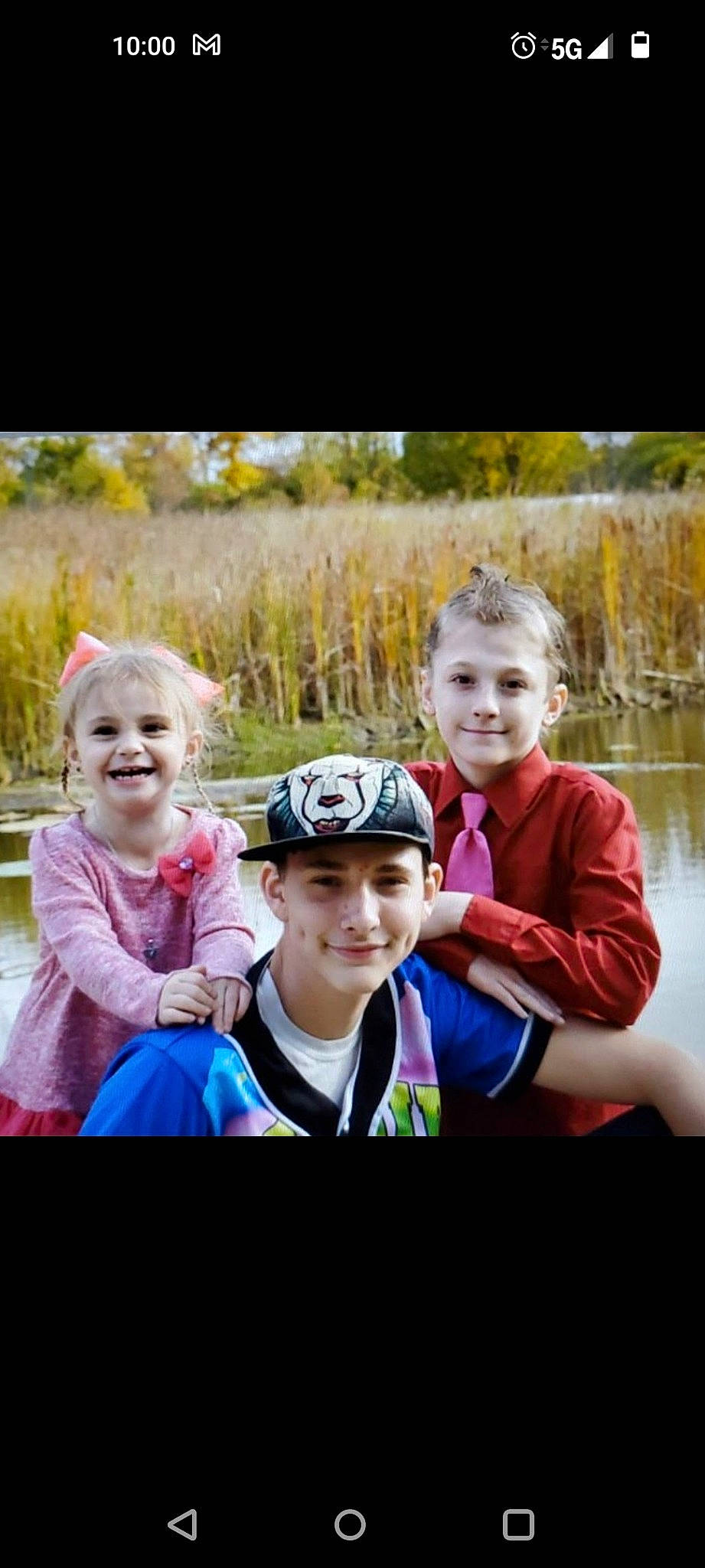 Tina is registered to the contest to win money with this photo: child, electric_blue, event, friendship, fun, grass, happy, headwear, human, joy, leisure, natural_landscape, people_in_nature, person, plant, recreation, smile, standing, style, t_shirt