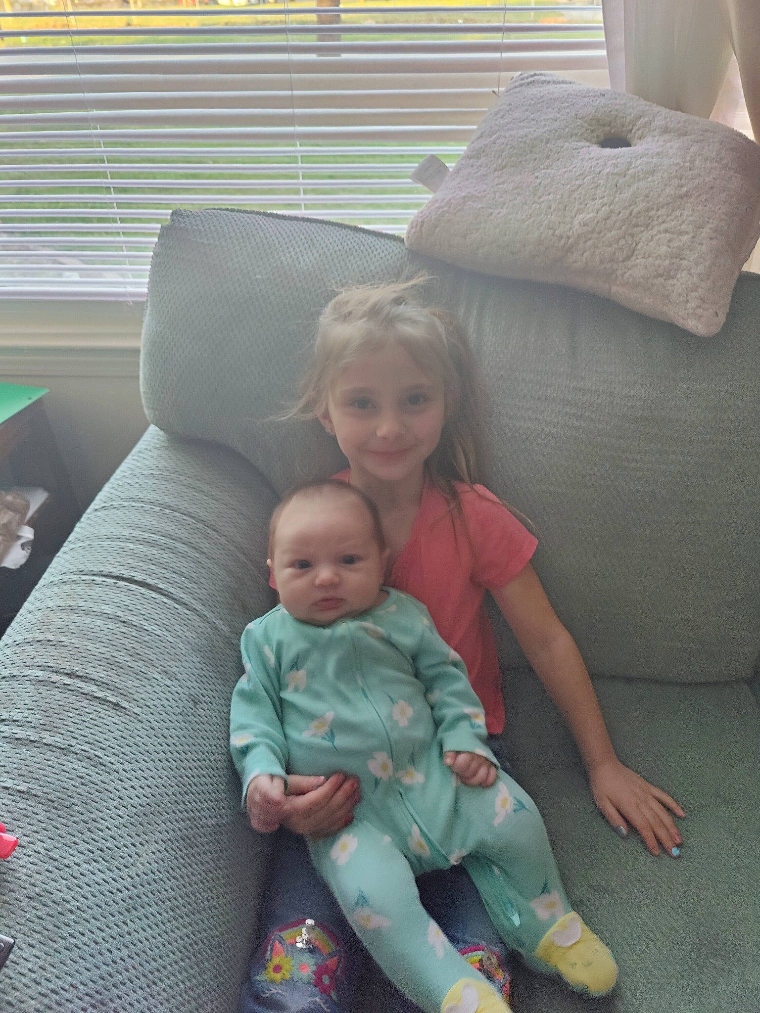 Tina Nicole joined the competition — help win amazing prizes! baby, baby_toddler_clothing, child, comfort, couch, eye, flooring, fun, human_body, joy, lap, living_room, mammal, person, room, sitting, skin, smile, textile, toddler