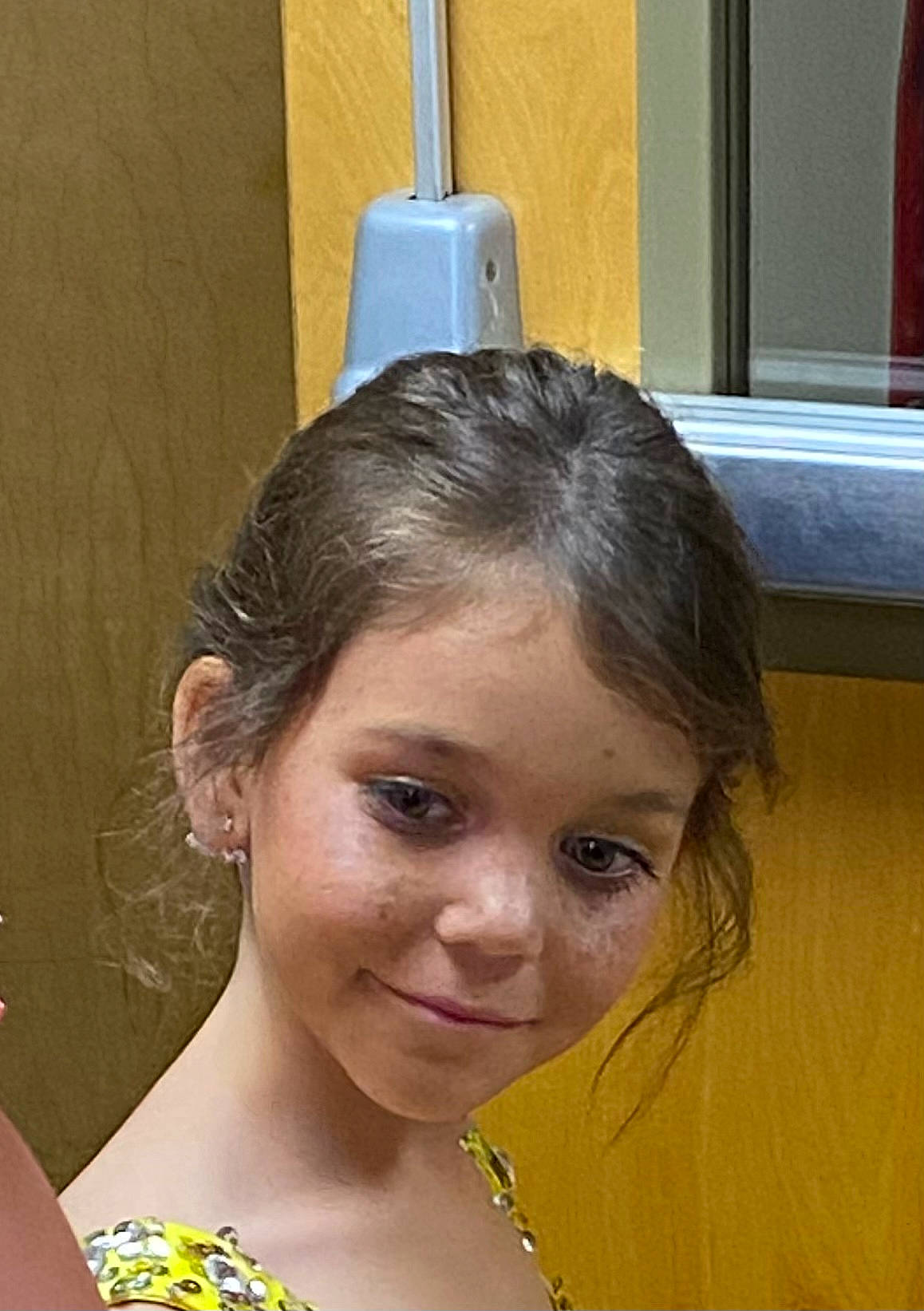 Kaylynn is registered to the contest to win money with this photo: black_hair, bun, chest, ear, event, eye, eyebrow, eyelash, forehead, fun, happy, iris, jewellery, joy, lip, long_hair, makeover, neck, nose, person