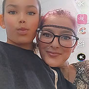 Séréna joined the competition — help win amazing prizes! selfie, two_people, portrait, indoor, young_person, adult, glasses, headband, black_shirt, casual, smile, pout, hair, face, ceiling, app_interface, photo_editing_tools, mobile_screen, digital_photo, social_media
