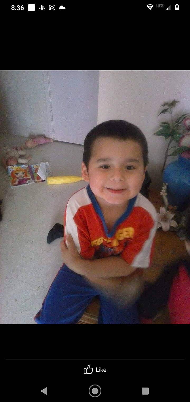 Kendrick is registered to the contest to win money with this photo: arm, baby, baby_toddler_clothing, cheek, child, chin, eye, face, fun, happy, head, iris, joy, mouth, nose, person, room, sitting, smile, t_shirt