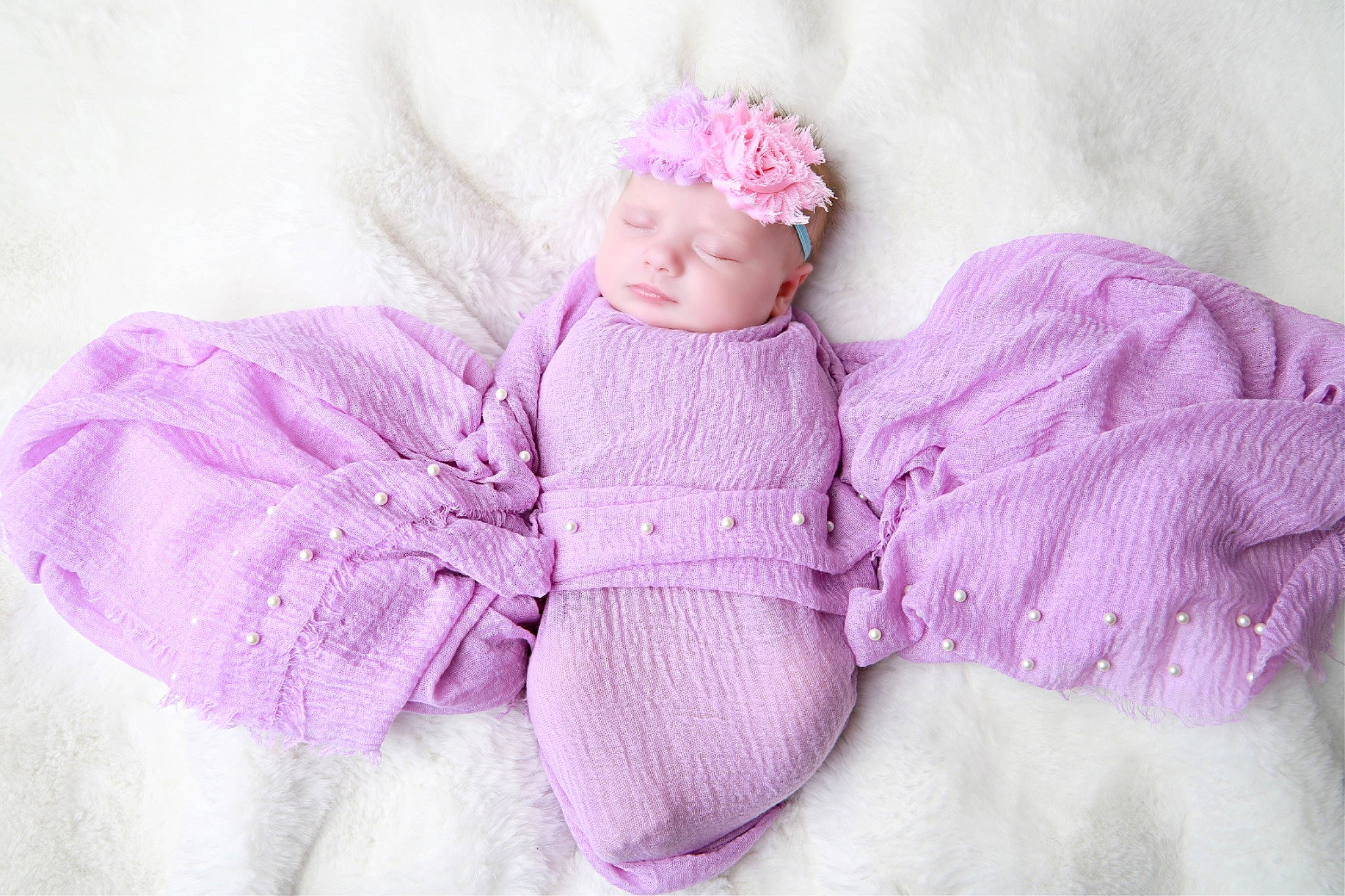 Oaklynn joined the competition — help win amazing prizes! arm, baby, baby_toddler_clothing, comfort, dress, embellishment, eye, face, head, headwear, knit_cap, linens, magenta, pattern, person, pink, purple, skin, sleeve, toddler