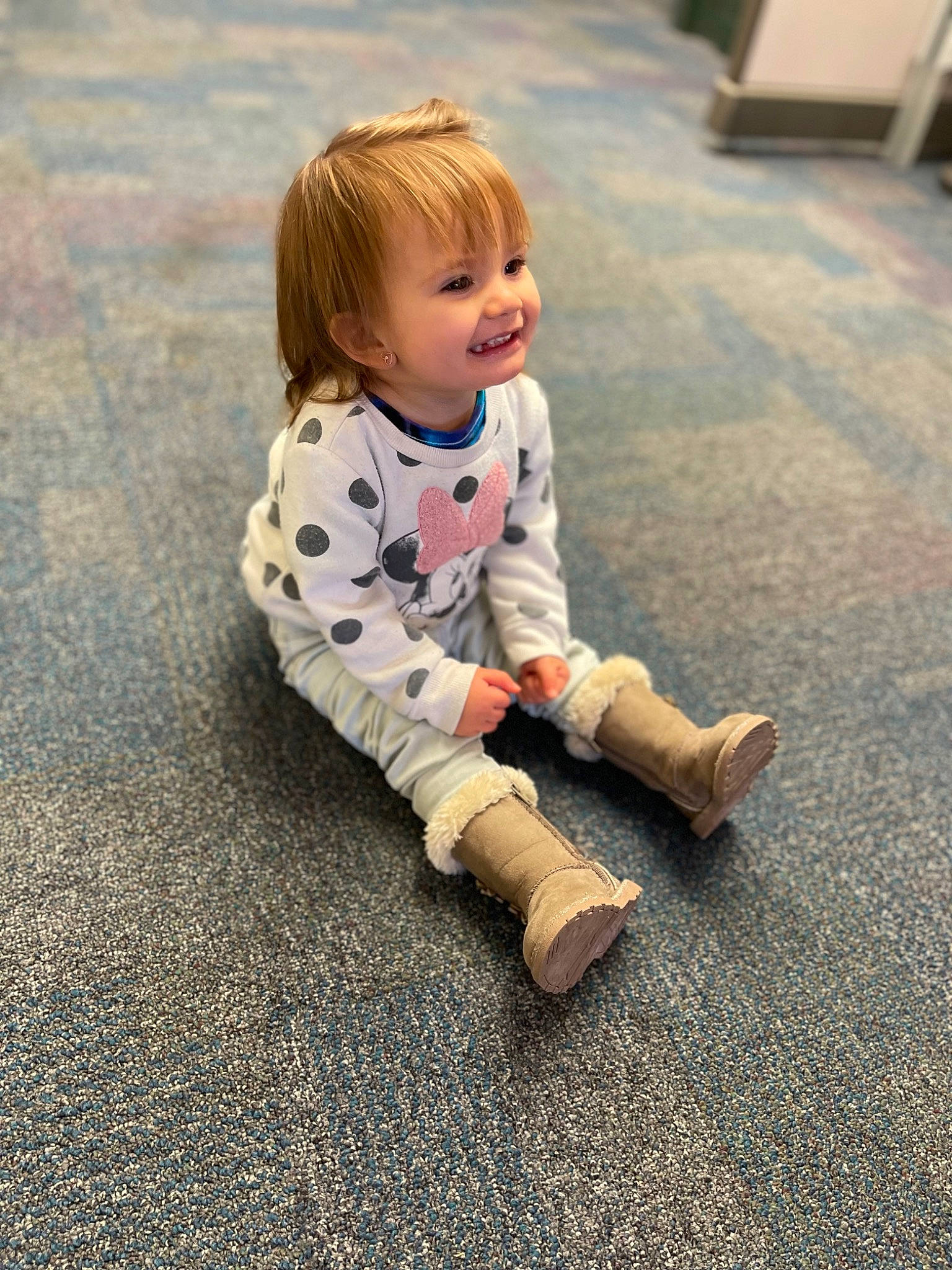 Adrian joined the competition — help win amazing prizes! asphalt, baby_toddler_clothing, blond, boot, child, face, floor, flooring, fun, grass, happy, hardwood, head, human_leg, joy, knee, person, road_surface, sitting, smile