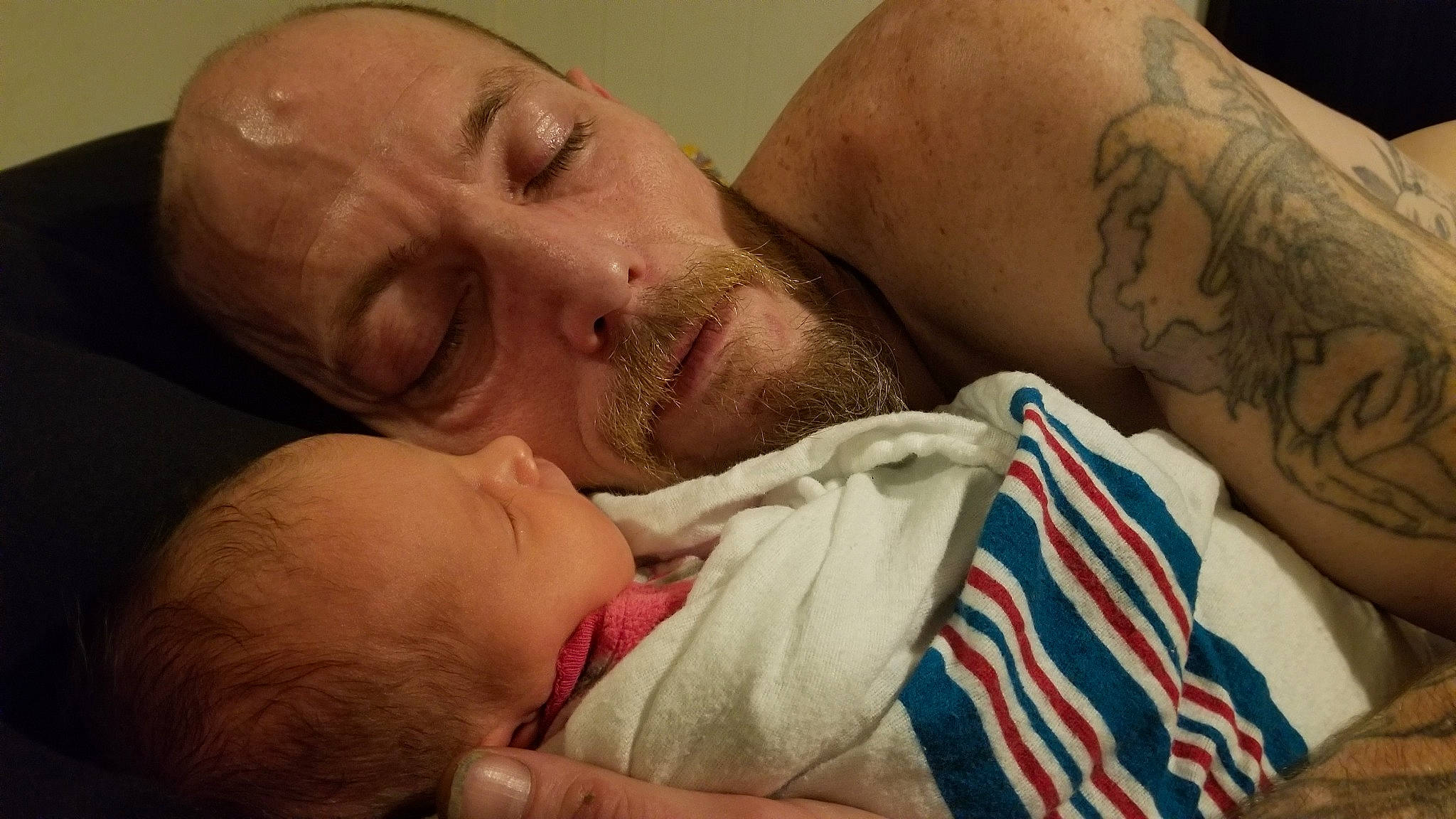 Ariana is registered to the contest to win money with this photo: baby, cheek, chest, comfort, cover_up, elbow, eyebrow, eyelash, finger, forehead, head, joint, mammal, mouth, muscle, neck, nose, person, skin, temporary_tattoo