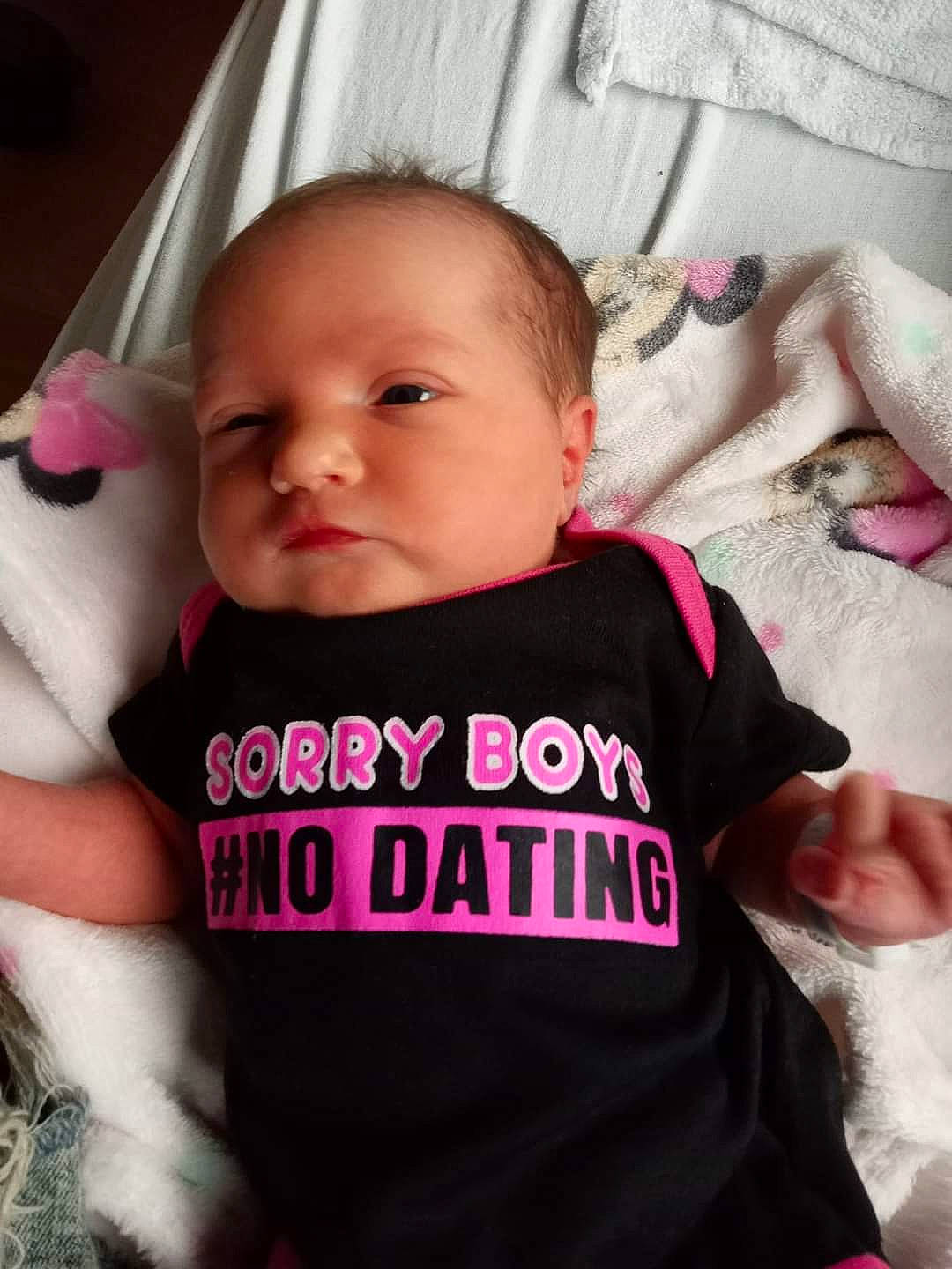 Ariana is registered to the contest to win money with this photo: baby_toddler_clothing, cheek, chin, comfort, cool, eye, eyebrow, eyelash, finger, happy, head, lip, mouth, neck, nose, person, pink, skin, sleeve, smile