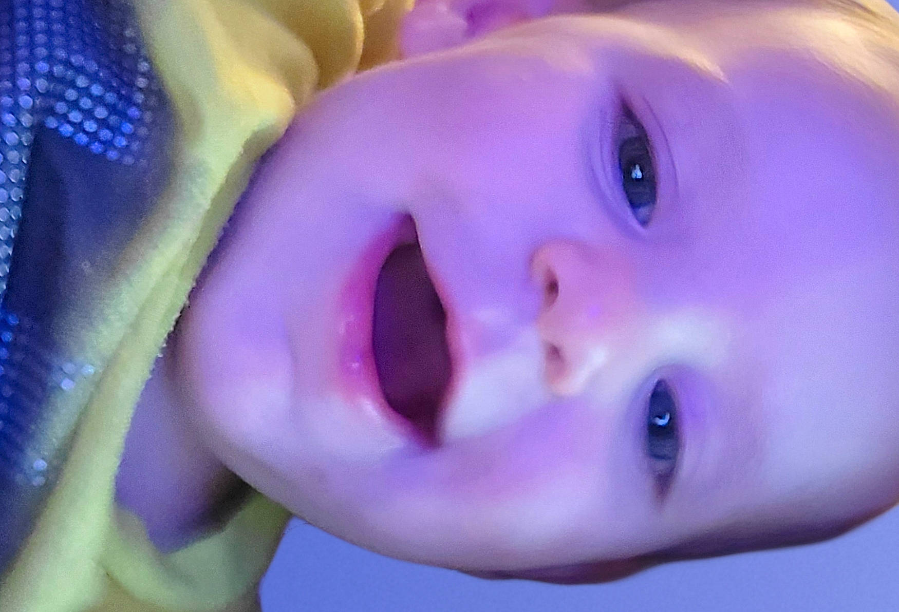 Gunner is registered to the contest to win money with this photo: azure, baby, cheek, chin, eye, eyebrow, eyelash, facial_expression, forehead, hair, happy, iris, lip, mouth, nose, organ, person, purple, skin, smile