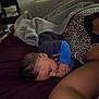 Kamaree is registered to the contest to win money with this photo: child, sleeping, blanket, bed, leopard_print, indoor, cozy, resting, person, clothing, furniture, pillow, dark, comfort, relaxation, soft, home, peaceful, portrait, toddler