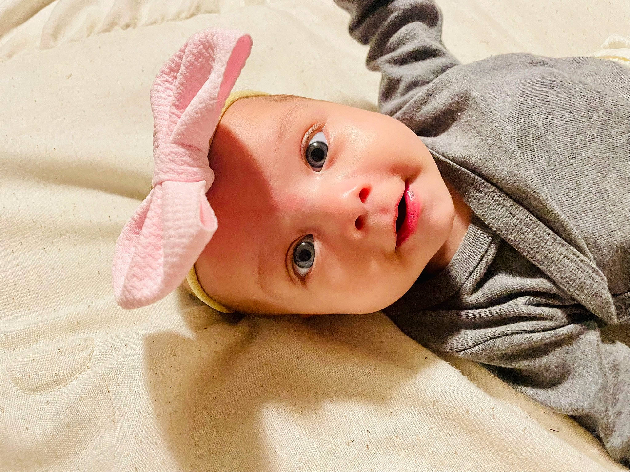 Naomi joined the competition — help win amazing prizes! baby, baby_toddler_clothing, cap, cheek, chin, close_up, comfort, eye, eyebrow, eyelash, head, headgear, headwear, iris, linens, lip, nose, person, skin, sleeve