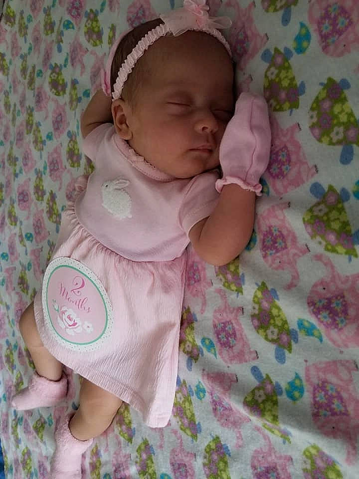 Nola is registered to the contest to win money with this photo: baby_products, baby_toddler_clothing, bedtime, cheek, child, day, eye, girl, infant, iris, lilac, person, pink, product, purple, skin, smile, textile, toddler, toy