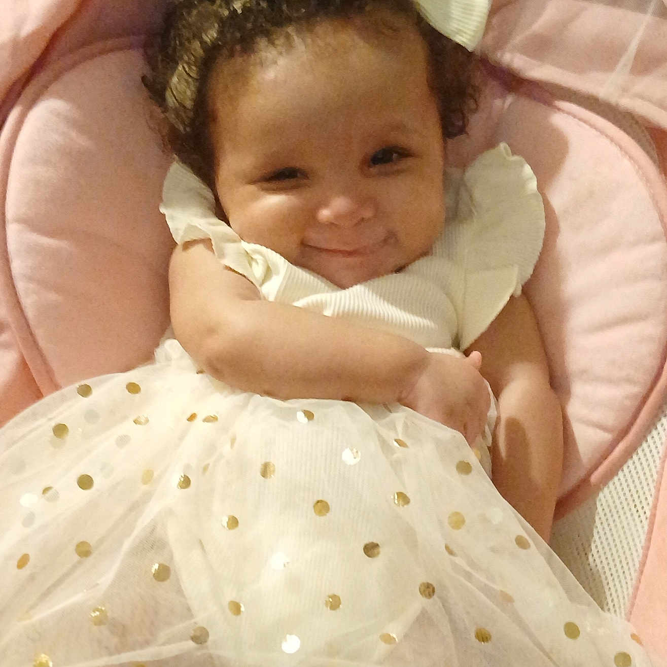 Her'Marah is registered to the contest to win money with this photo: baby, bed, clothing, costume, crib, cushion, dress, face, furniture, happy, hat, head, homedecor, infantbed, laughing, newborn, person, photography, portrait, smile