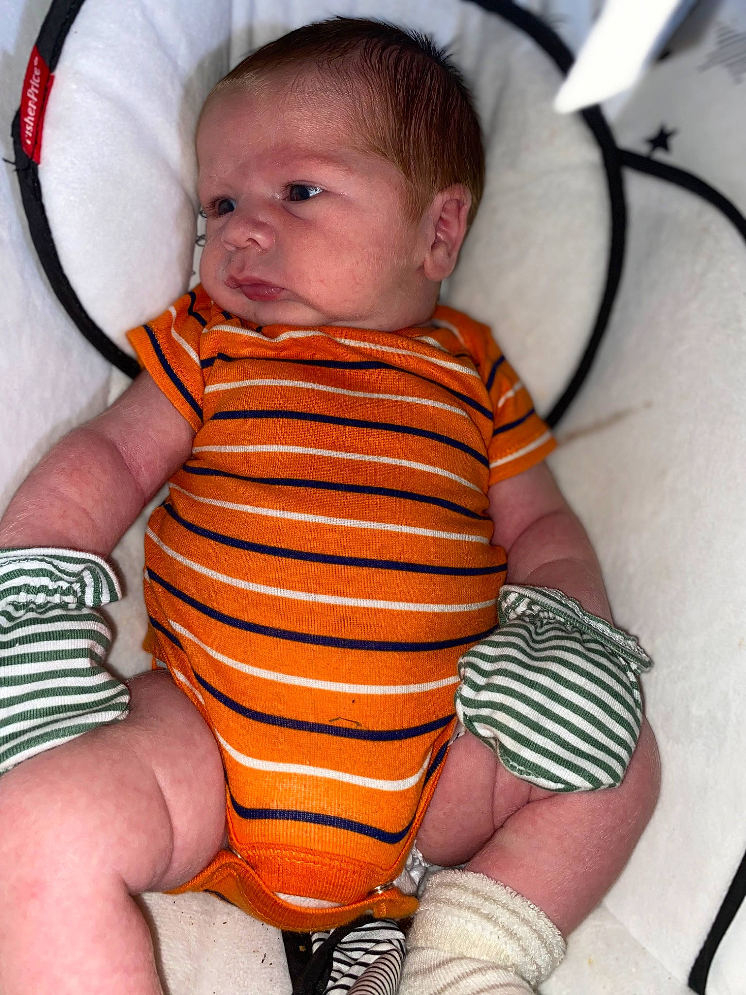 Theos joined the competition — help win amazing prizes! baby, baby_toddler_clothing, cheek, comfort, finger, head, iris, joint, leg, lip, mouth, neck, nose, orange, organ, person, skin, sleeve, stomach, thigh