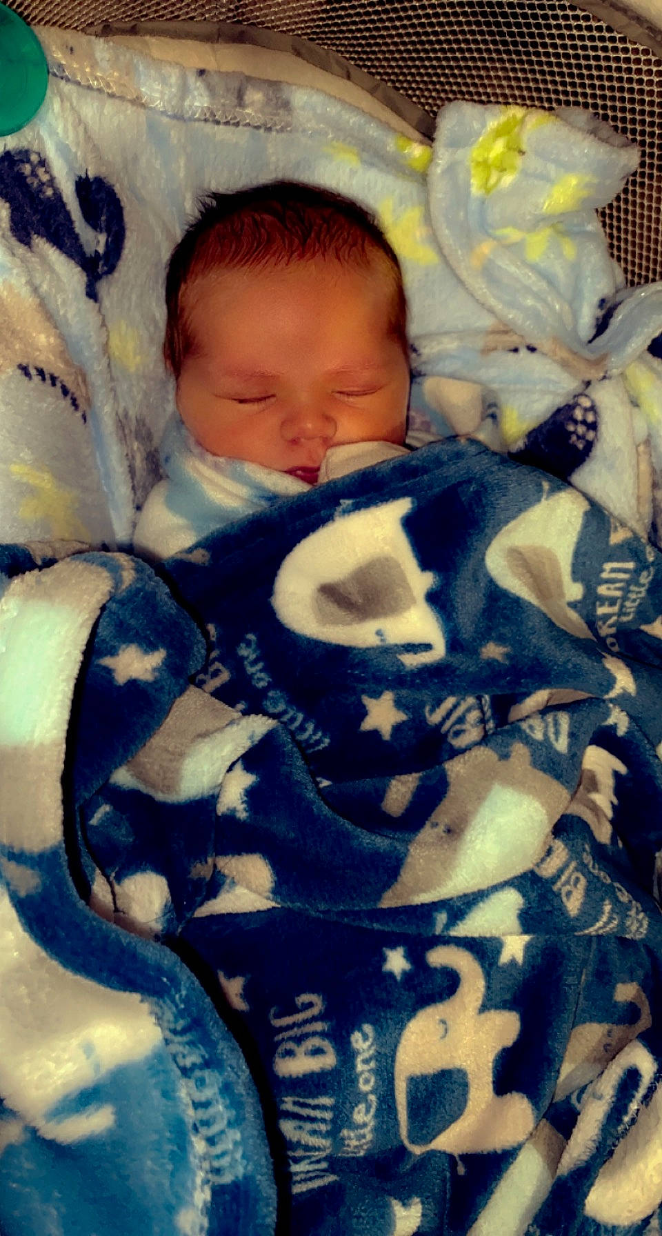 Theos is registered to the contest to win money with this photo: baby, baby_products, baby_sleeping, baby_toddler_clothing, bedding, bedtime, blanket, cheek, child, comfort, cool, fur, happy, linens, nap, pattern, person, room, sitting, sleep