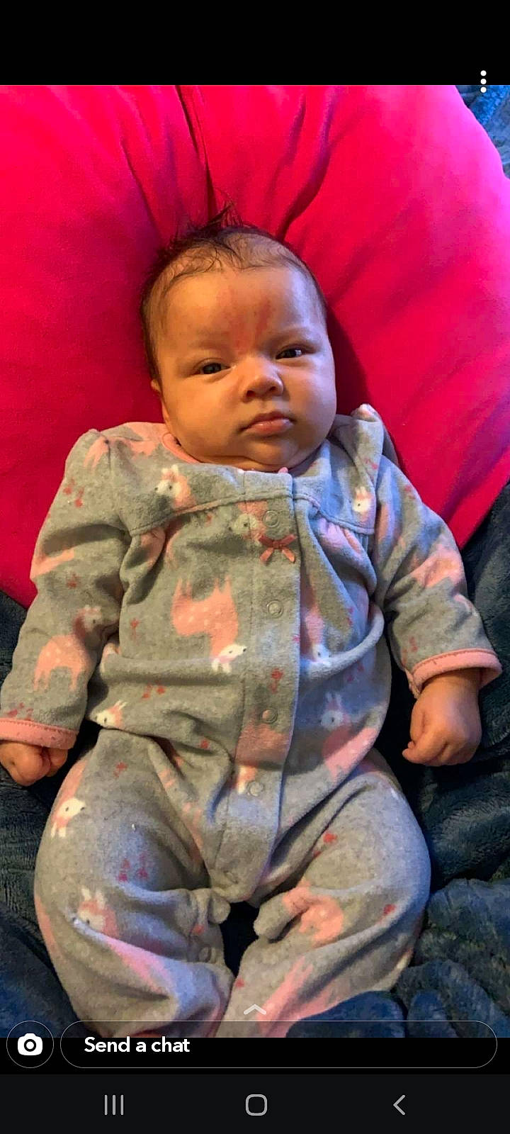 Clementine is registered to the contest to win money with this photo: baby, baby_toddler_clothing, camouflage, cheek, child, chin, comfort, eye, face, finger, fun, human_body, military_camouflage, mouth, nose, outerwear, person, skin, sleeve, textile