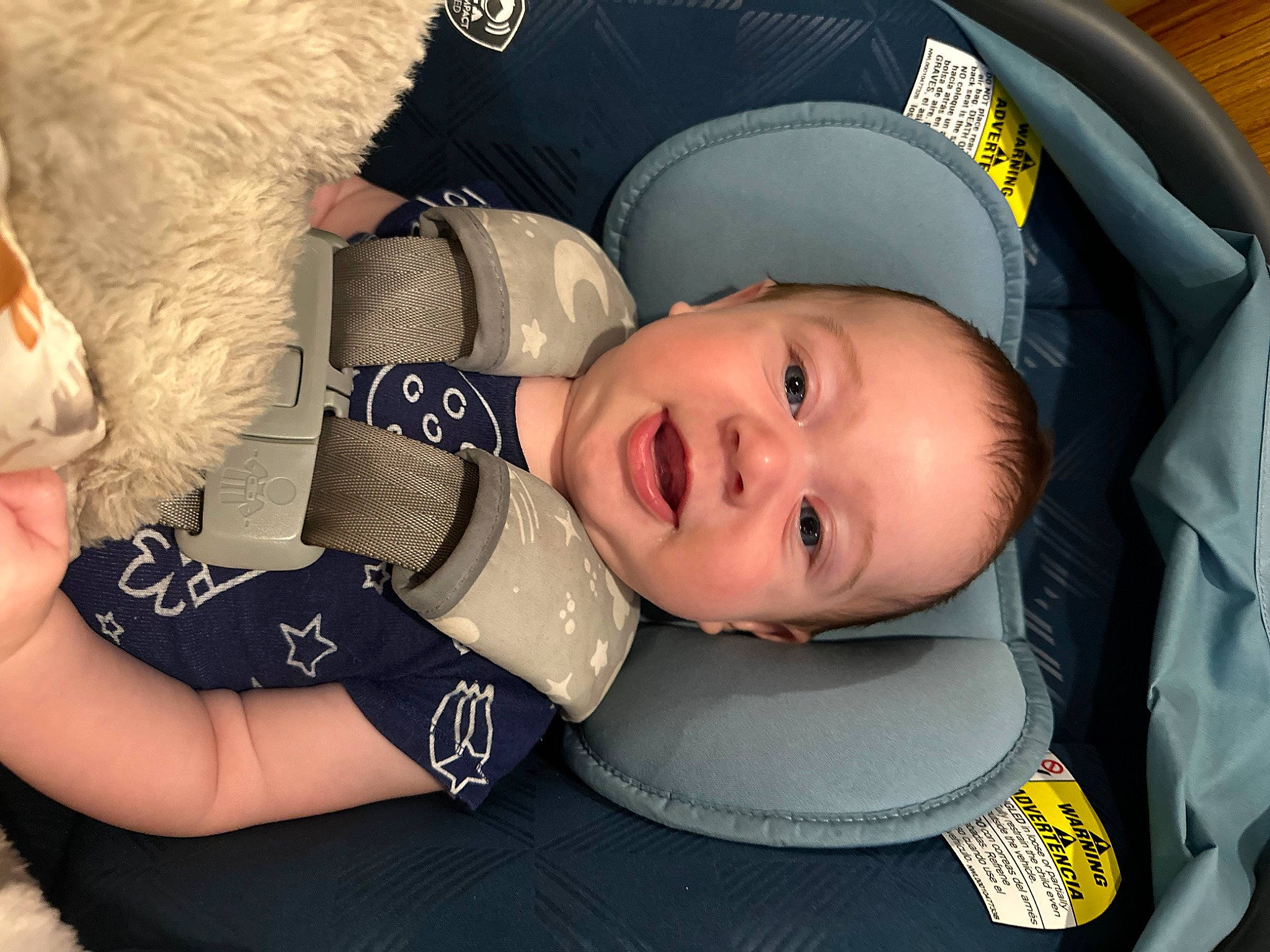 Matthew is registered to the contest to win money with this photo: auto_part, baby, baby_carriage, baby_products, baby_toddler_clothing, car_seat, cheek, child, comfort, eye, eyelash, fashion_accessory, fun, happy, headgear, mammal, mouth, person, personal_protective_equipment, smile