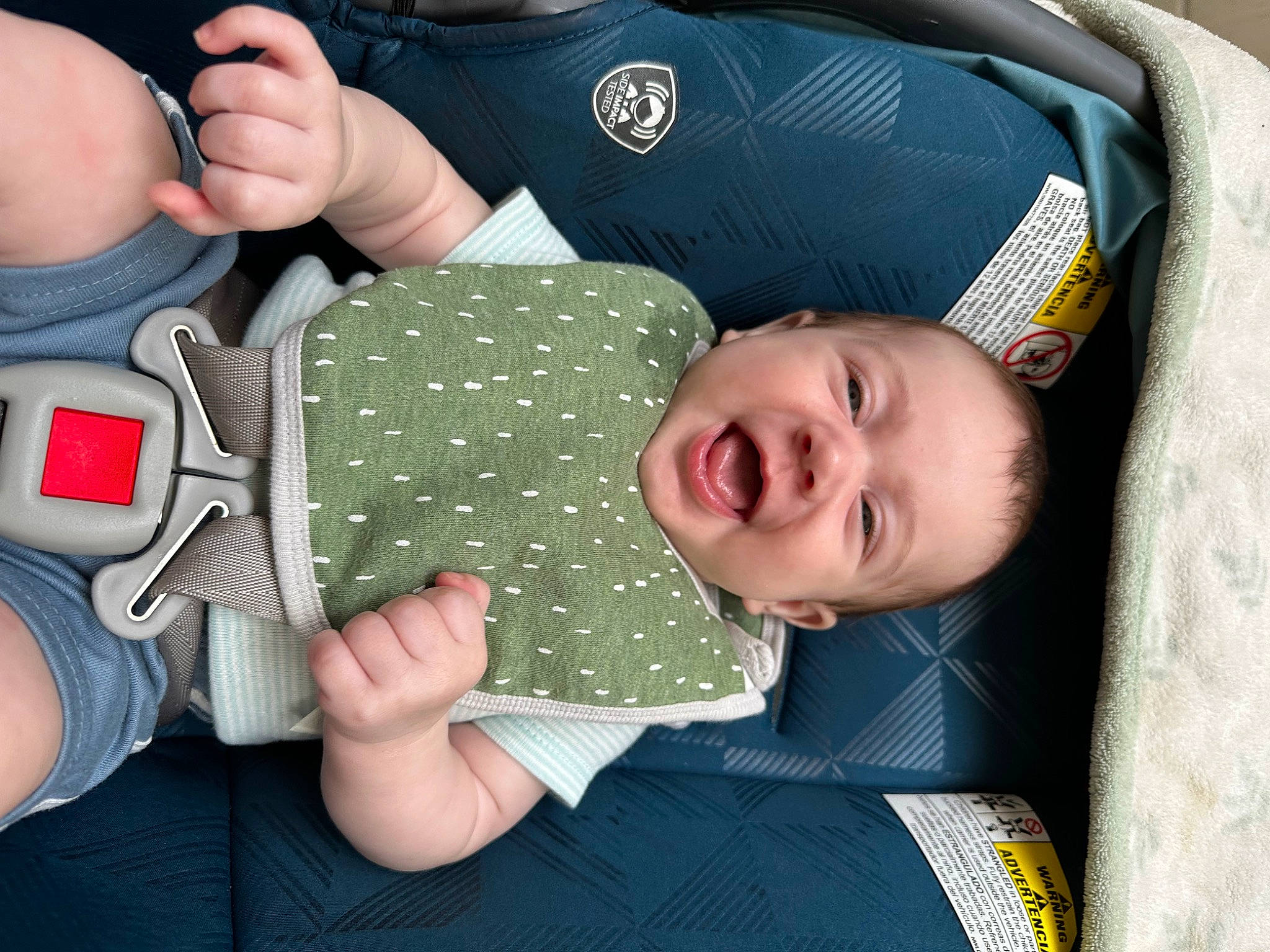 Matthew is registered to the contest to win money with this photo: baby, baby_products, baby_toddler_clothing, child, comfort, finger, fun, gesture, hand, happy, linens, mouth, nail, pattern, person, sleeve, smile, thumb, toddler, wrist