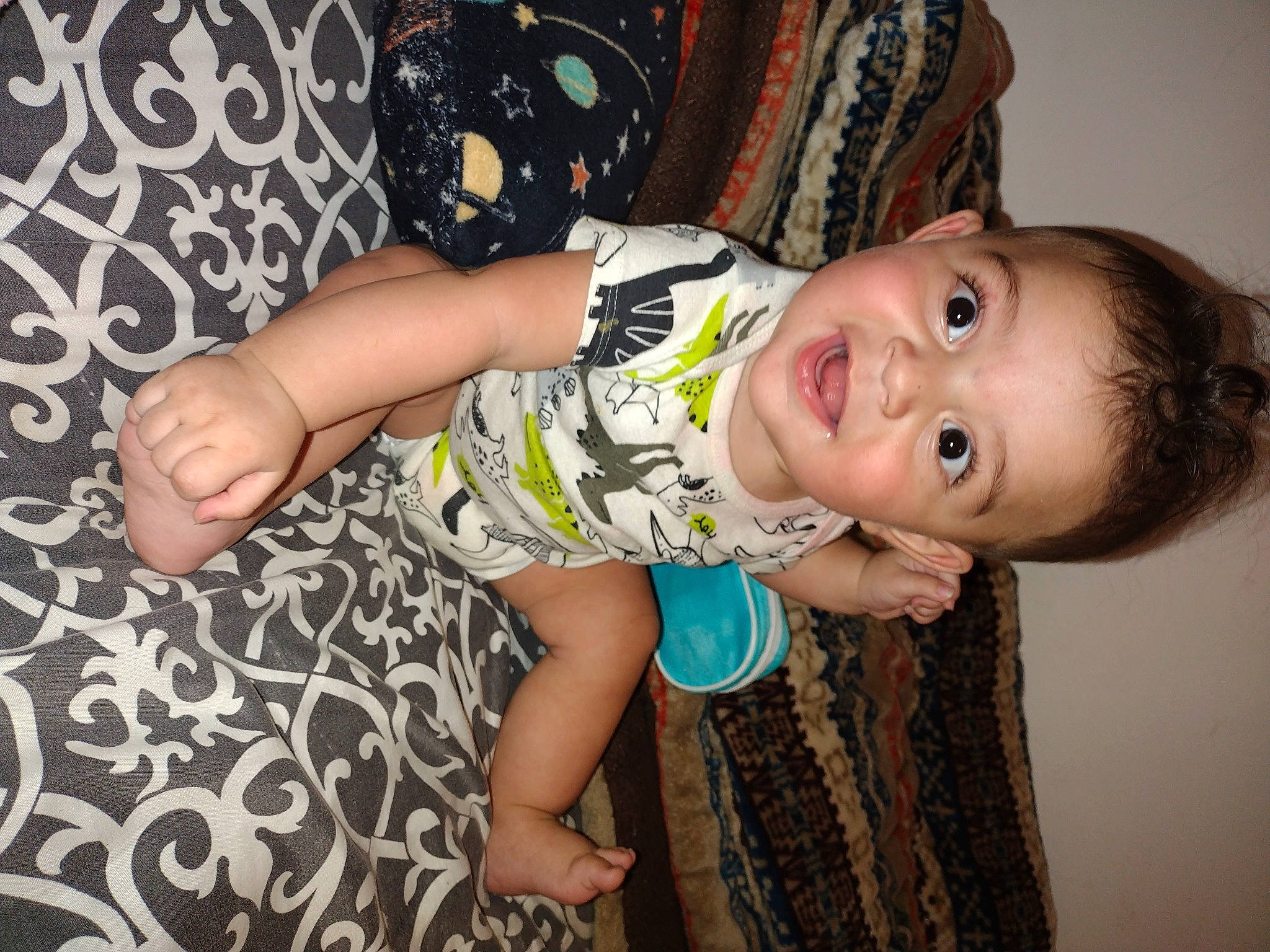 Liam joined the competition — help win amazing prizes! baby_toddler_clothing, cheek, child, day_dress, dress, face, flash_photography, fun, happy, human_body, human_leg, pattern, person, sitting, skin, sleeve, smile, textile, thigh, toddler