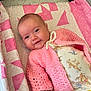 Elizabeth joined the competition — help win amazing prizes! baby, bed, blanket, clothing, couch, cradle, crib, cushion, face, furniture, head, homedecor, infantbed, knitwear, newborn, person, photography, portrait, quilt, sweater