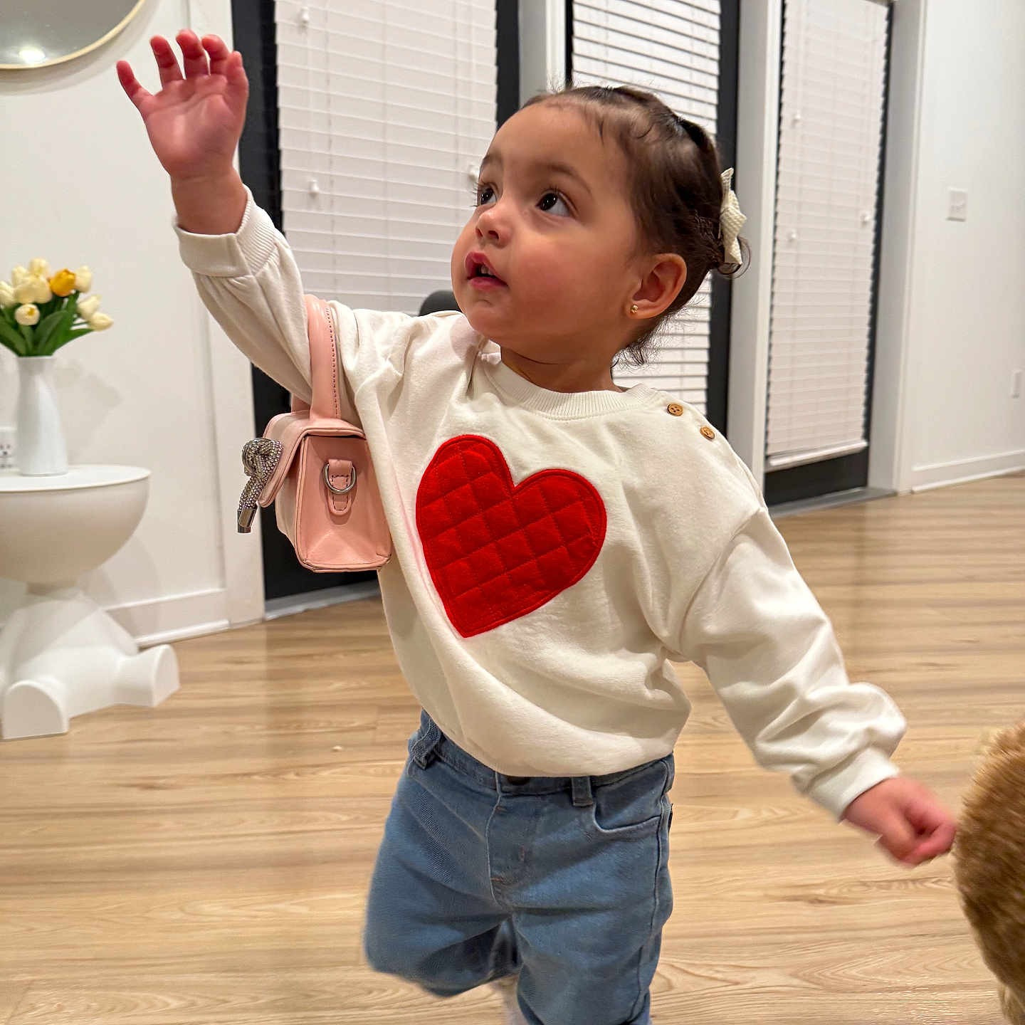 Maiya is registered to the contest to win money with this photo: child, curly_hair, cute, door, earrings, floor, heart, indoor, jeans, mirror, person, purse, sneakers, sweater, toddler, tulips, vase, white_walls, window_blinds, wooden_floor