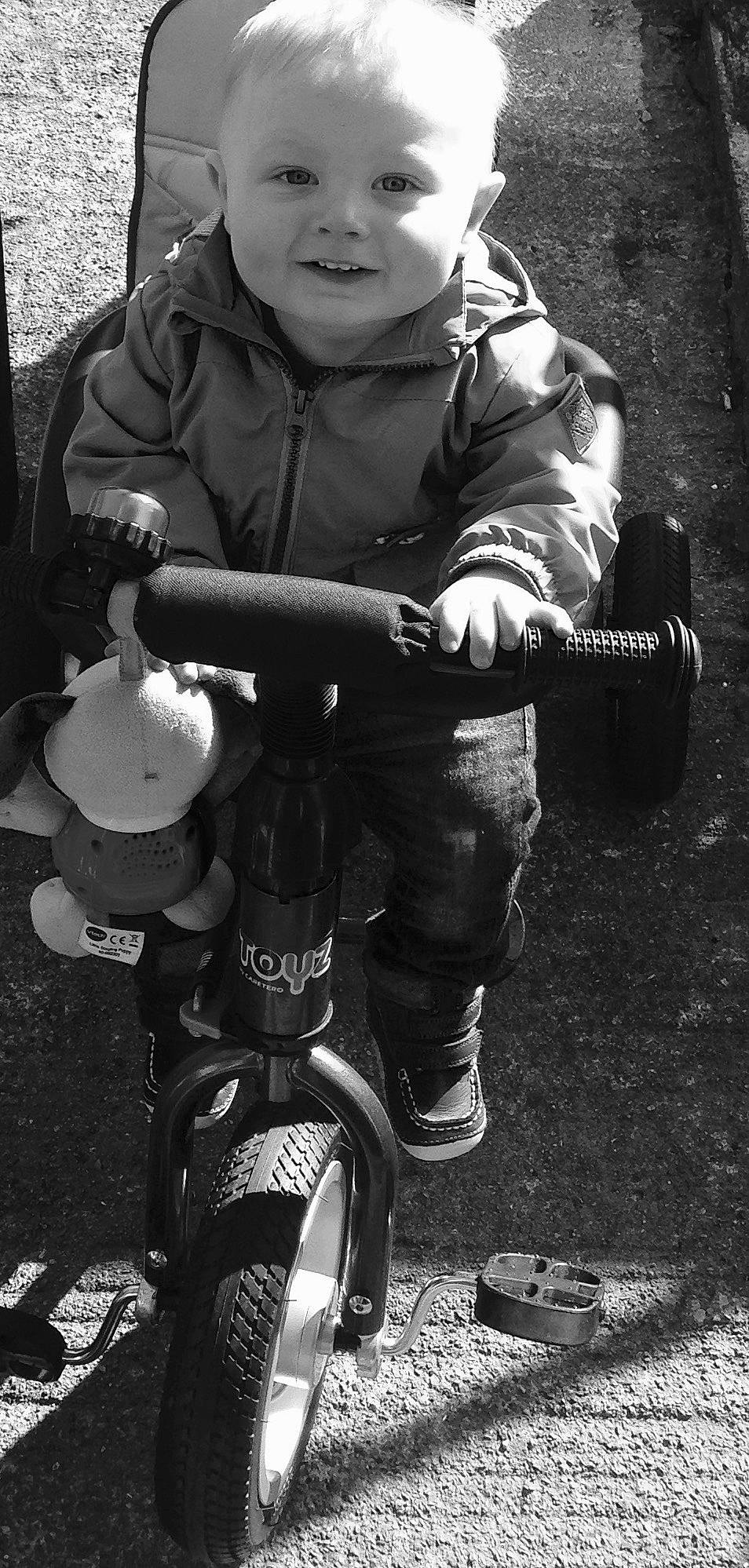 Kyron is registered to the contest to win money with this photo: black_and_white, joy, monochrome, person, photography, style, vehicle, wheel