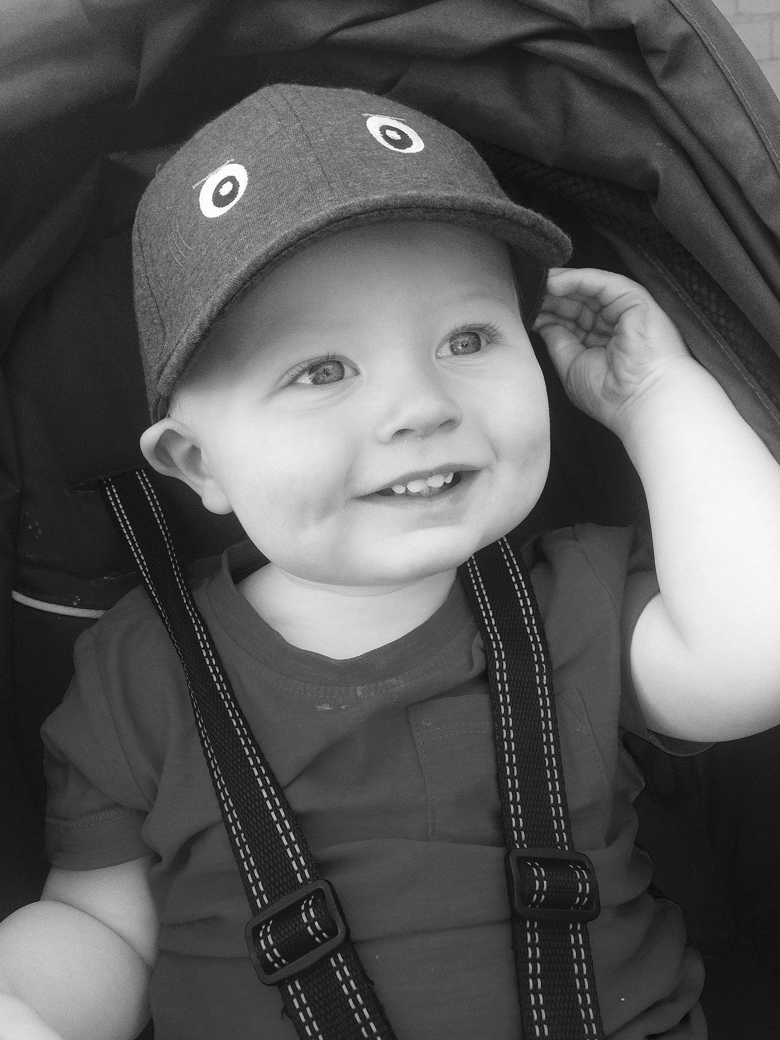 Kyron is registered to the contest to win money with this photo: baby, baseball_cap, black, black_and_white, cheek, child, cool, eye, face, facial_expression, fun, head, headgear, headwear, joy, monochrome, person, photograph, photography, skin