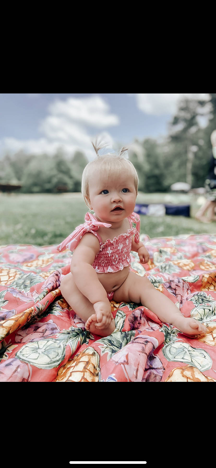 Blakelynn joined the competition — help win amazing prizes! baby, baby_toddler_clothing, beauty, cheek, child, cloud, dress, flash_photography, grass, happy, pattern, people_in_nature, person, pink, sitting, skin, sky, smile, toddler, toy