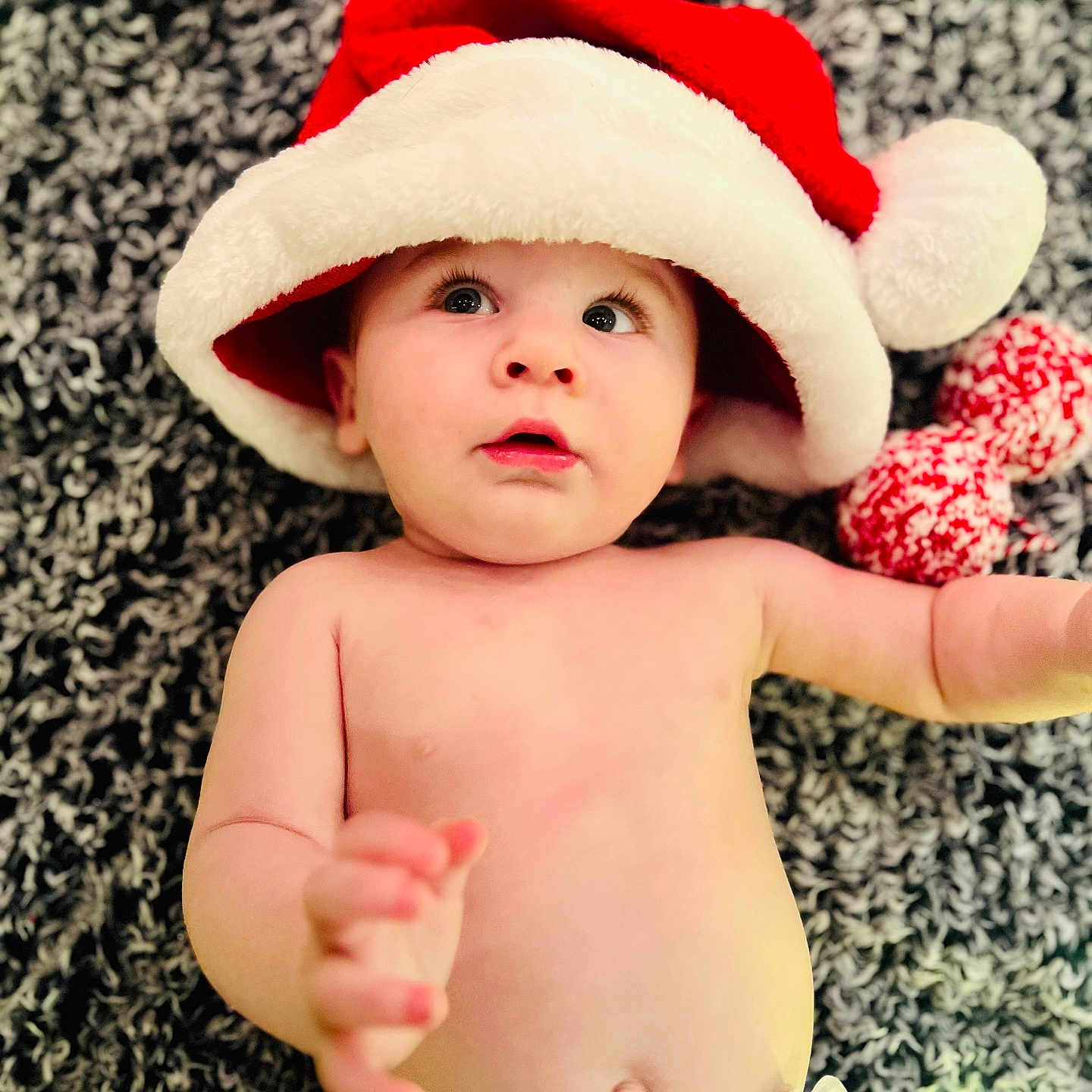 Winstin joined the competition — help win amazing prizes! baby, bodypart, bonnet, cap, clothing, costume, diaper, face, finger, hand, happy, hat, head, newborn, person, photography, portrait, sitting, smile, sunhat