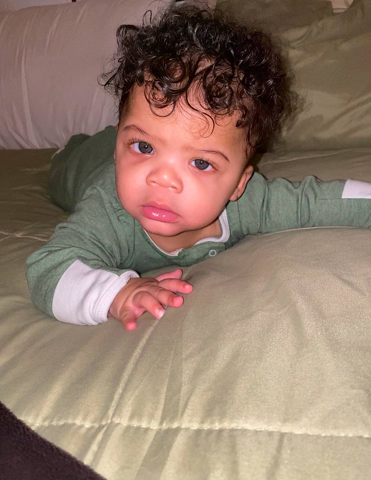 Terrence is registered to the contest to win money with this photo: baby, baby_toddler_clothing, cheek, chin, comfort, eye, finger, flash_photography, gesture, happy, head, human_body, iris, lip, mouth, neck, nose, person, skin, sleeve