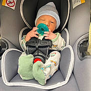 Sawyer joined the competition — help win amazing prizes! baby, infant, car_seat, pacifier, hat, pajamas, sleepy, straps, child, newborn, cute, indoors, resting, baby_clothes, seat_belt, fabric, close_up, child_seat, sitting, portrait