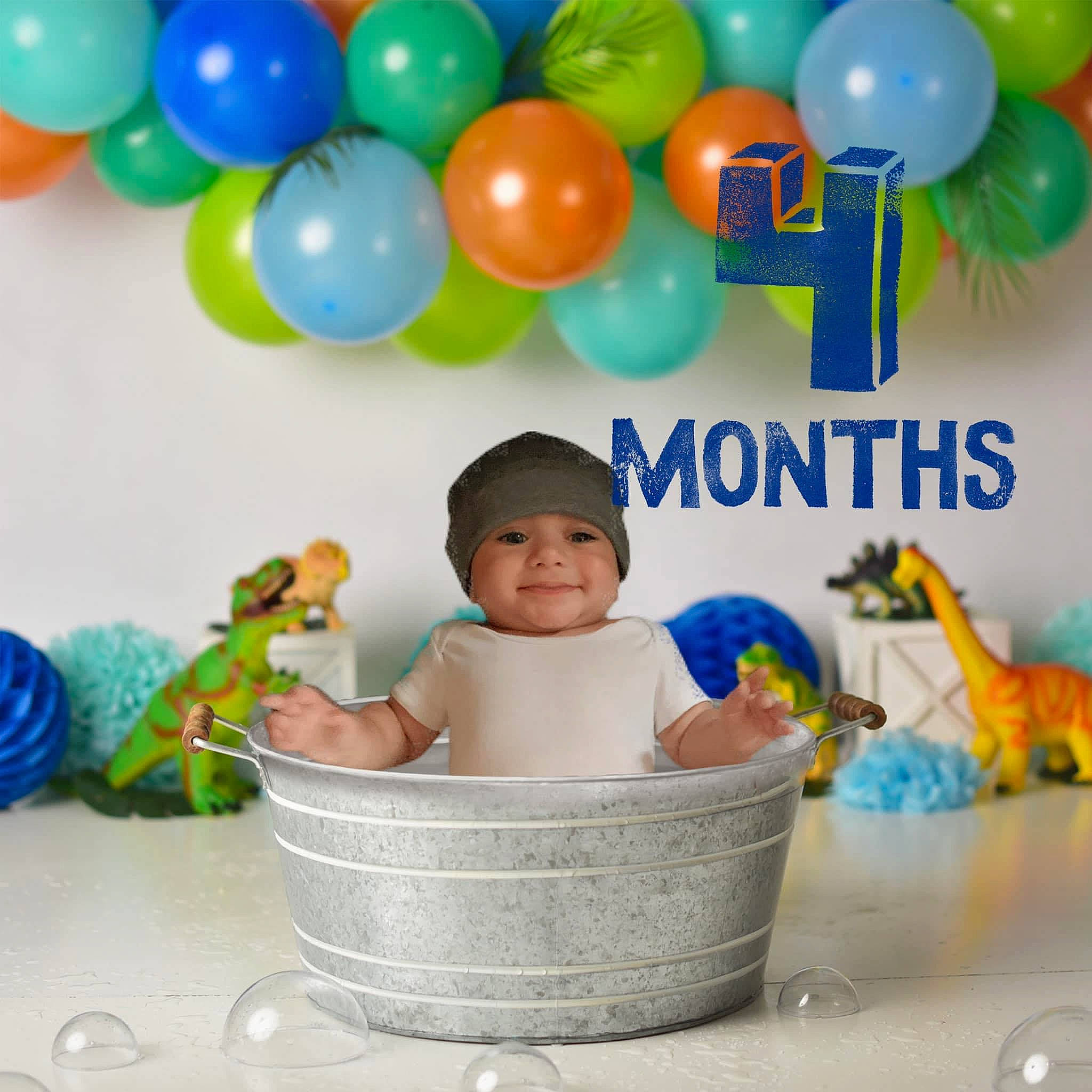 Dylan Jr is registered to the contest to win money with this photo: baby, baby_bathing, baby_products, baby_toddler_clothing, balloon, bathing, beauty, child, event, font, fun, green, happy, headwear, joy, party_supply, person, photograph, product, sharing