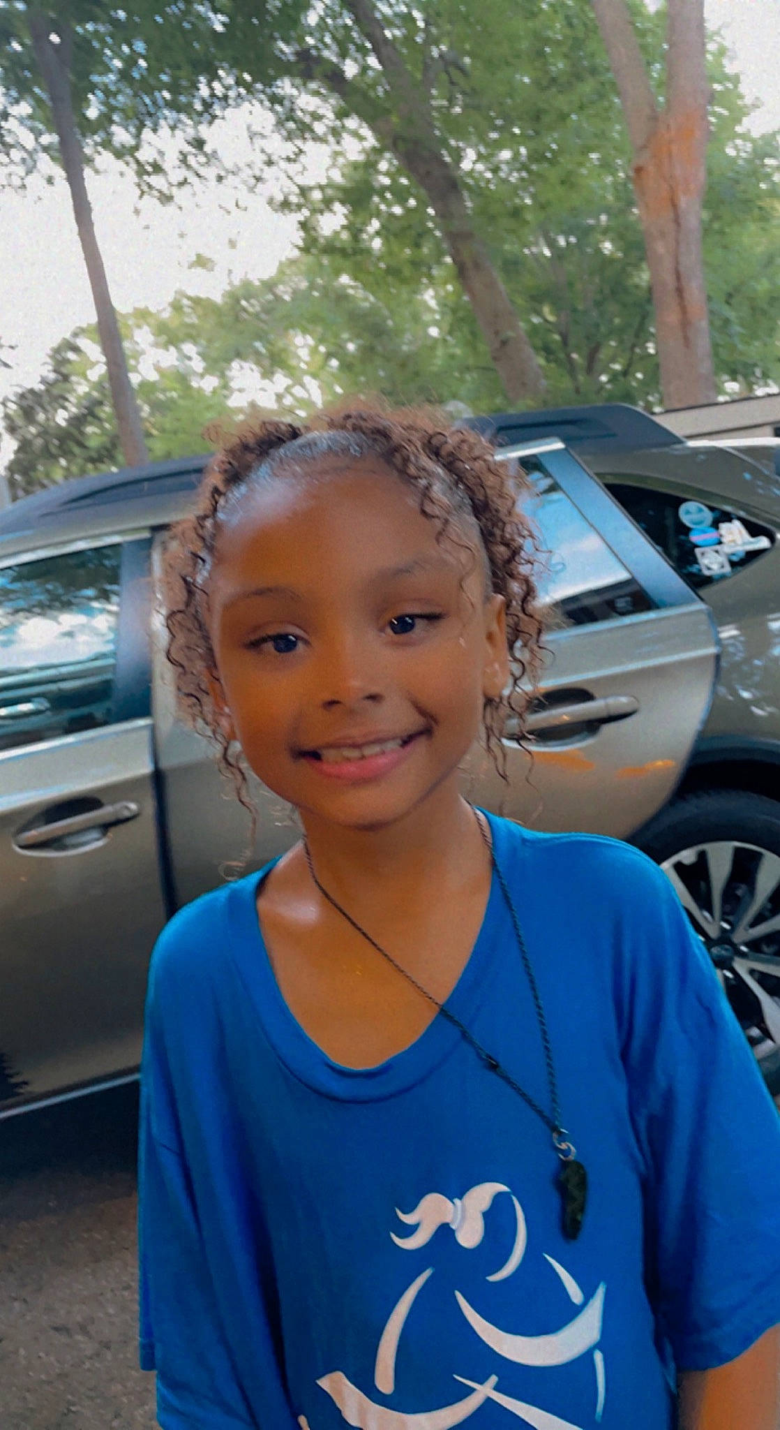 Jocelynn joined the competition — help win amazing prizes! automotive_design, automotive_exterior, automotive_lighting, automotive_tire, car, cool, hairstyle, happy, hood, joy, land_vehicle, leisure, motor_vehicle, person, plant, smile, standing, tire, vehicle, vehicle_door