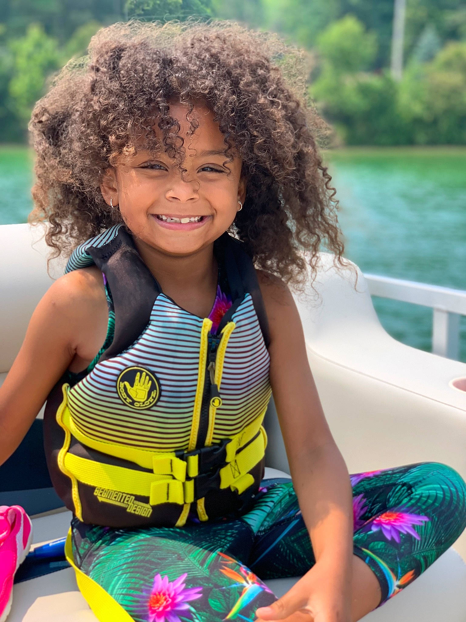 Jocelynn is registered to the contest to win money with this photo: beauty, blue, child, electric_blue, event, fun, green, happy, joy, leisure, person, personal_protective_equipment, photograph, recreation, smile, summer, swimwear, thigh, toddler, water