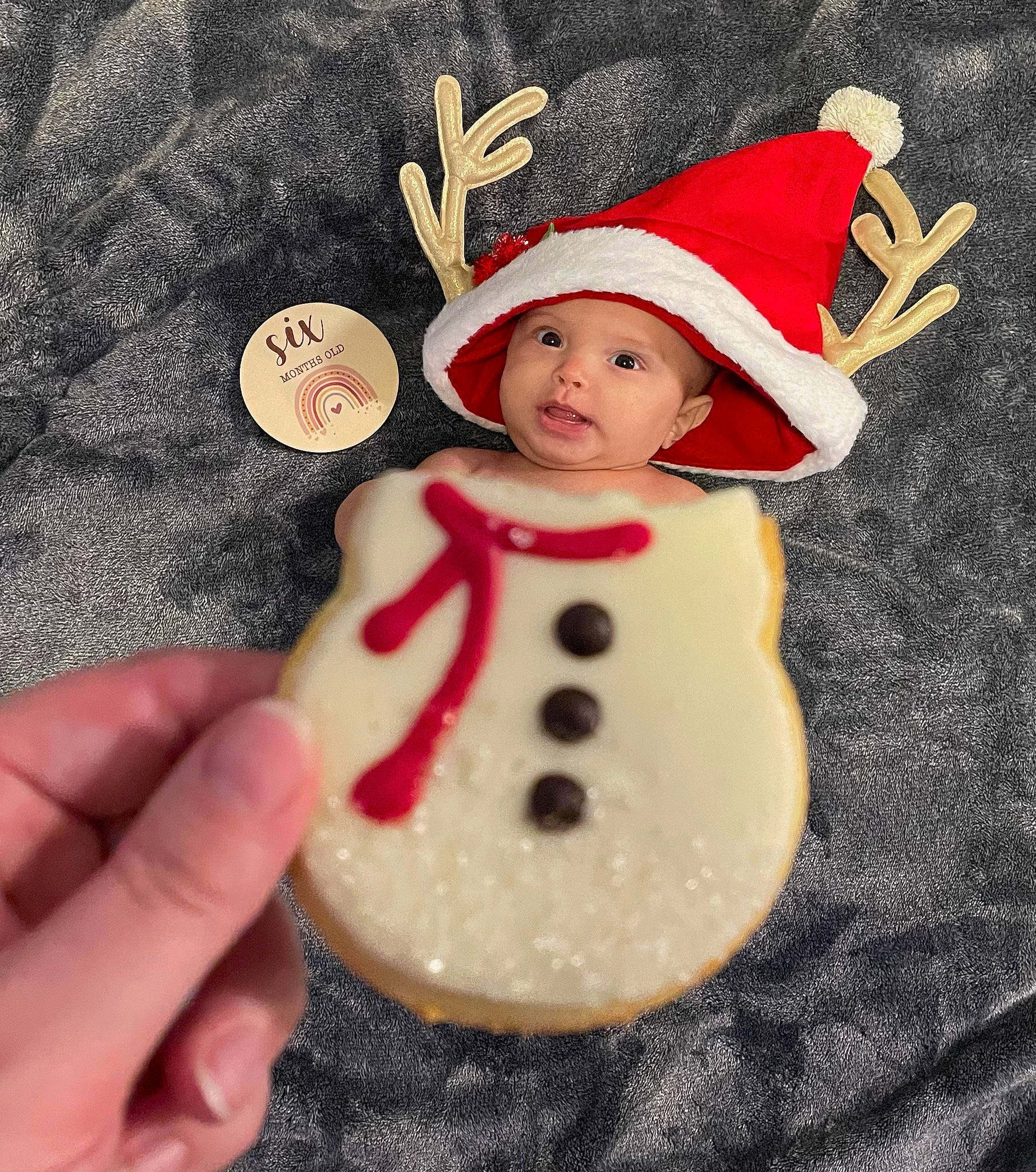 Kaidyn joined the competition — help win amazing prizes! baby_toddler_clothing, carmine, child, christmas, christmas_decoration, christmas_eve, christmas_ornament, costume_hat, event, fashion_accessory, fur, happy, hat, headwear, holiday, holiday_ornament, ornament, person, sleeve, snowman