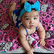 Yuli joined the competition — help win amazing prizes! baby, child, headband, blue, bow, hello_kitty, blanket, pink, pattern, curious, face, infant, cute, indoors, person, skin, hand, lying_down, plush, clothing