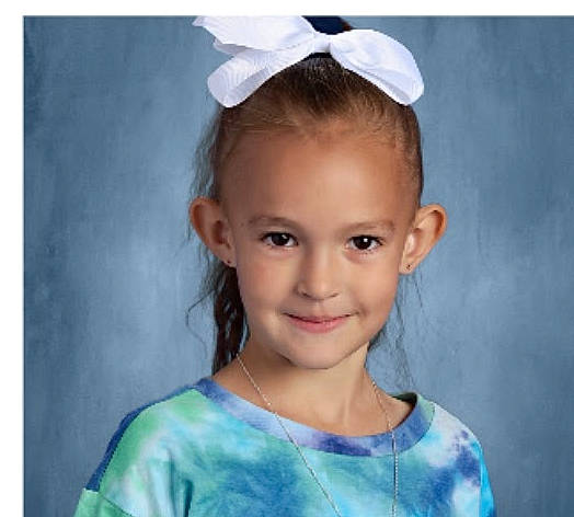 Jenna is registered to the contest to win money with this photo: cheek, child, chin, ear, electric_blue, eyebrow, eyelash, face, flash_photography, hair, happy, head, headband, headgear, headpiece, iris, joy, neck, person, sleeve