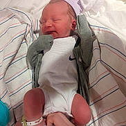 David joined the competition — help win amazing prizes! newborn, baby, infant, smile, hospital, blanket, mittens, cap, sock, hands, person, clothing, bed, cute, resting, peaceful, human, small, wrapped, cozy