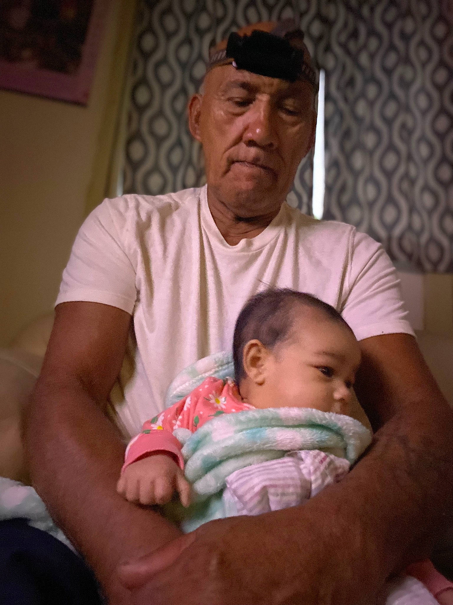 Joanna is registered to the contest to win money with this photo: abdomen, baby, beard, cheek, chest, child, comfort, elbow, event, gesture, happy, headwear, mouth, muscle, organ, person, sitting, skin, stomach, t_shirt